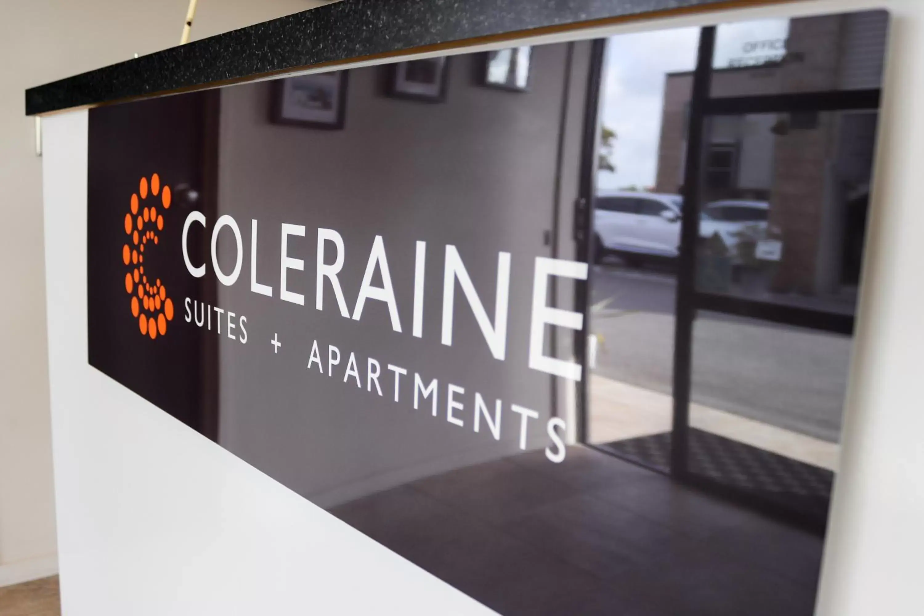 Property logo or sign in Coleraine Suites & Apartments