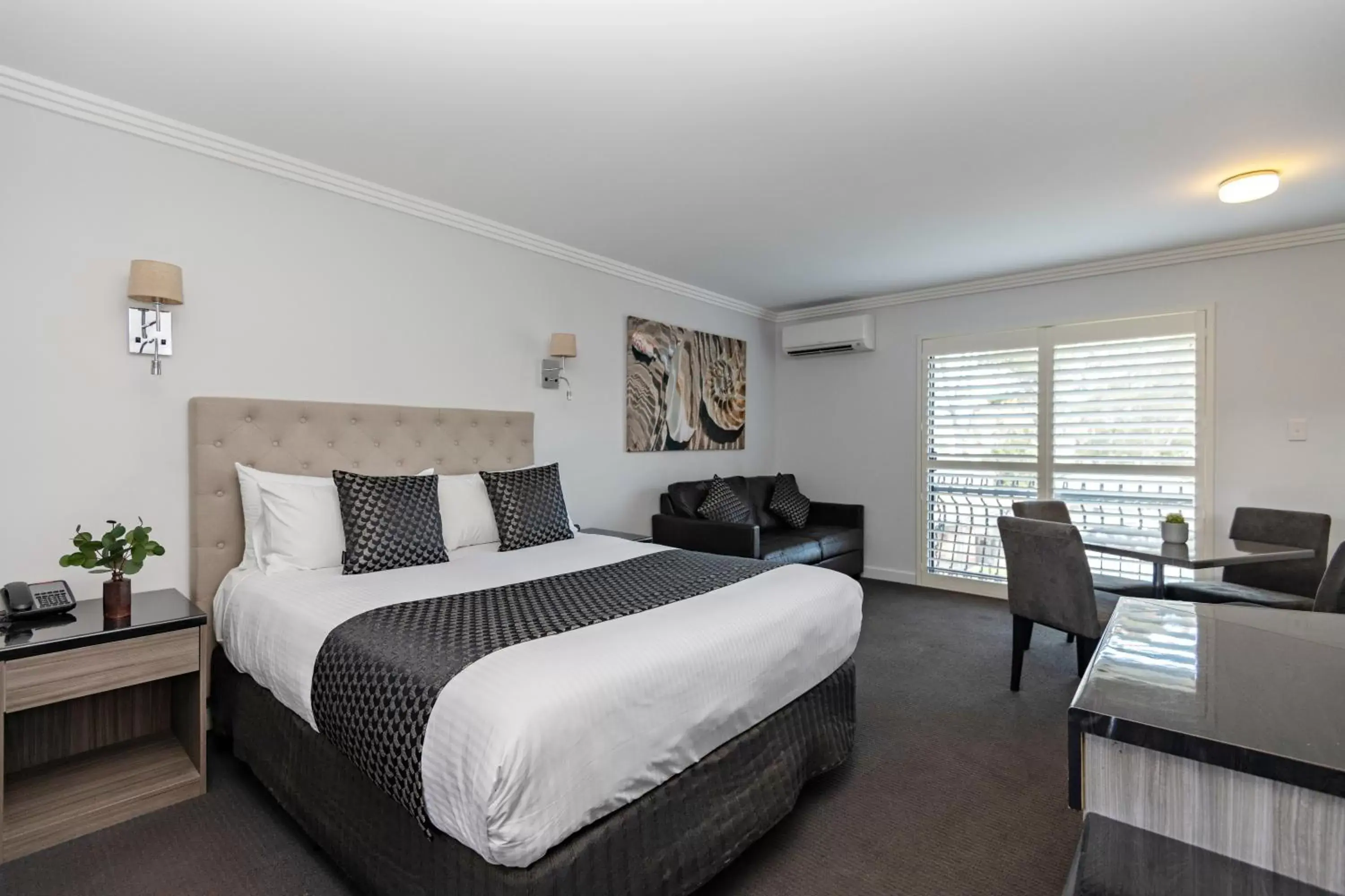 Seating area, Bed in Lincoln Downs Resort Batemans Bay, Signature Collection by Best Western