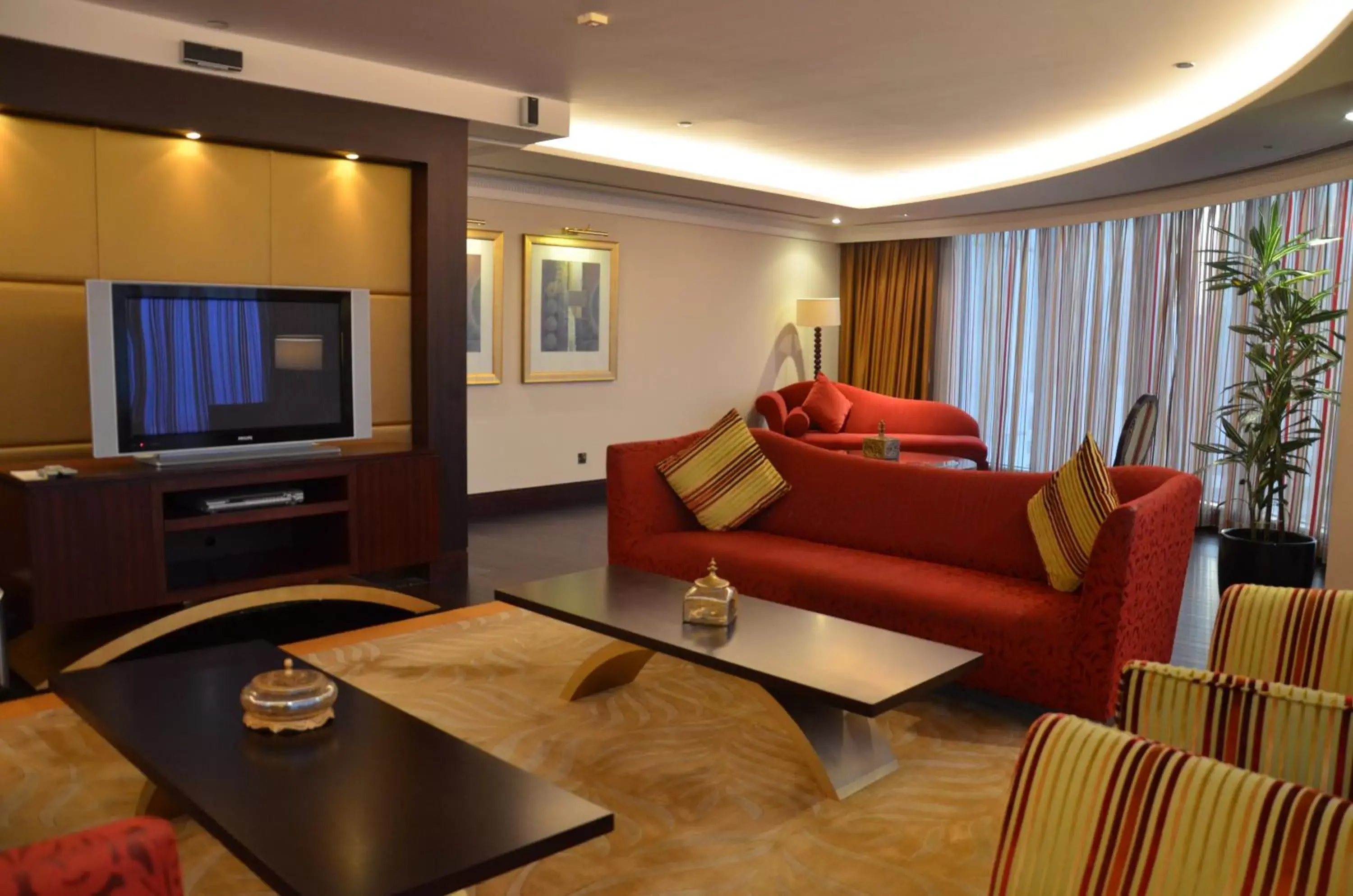 TV and multimedia, Seating Area in The Diplomat Radisson Blu Hotel Residence & Spa