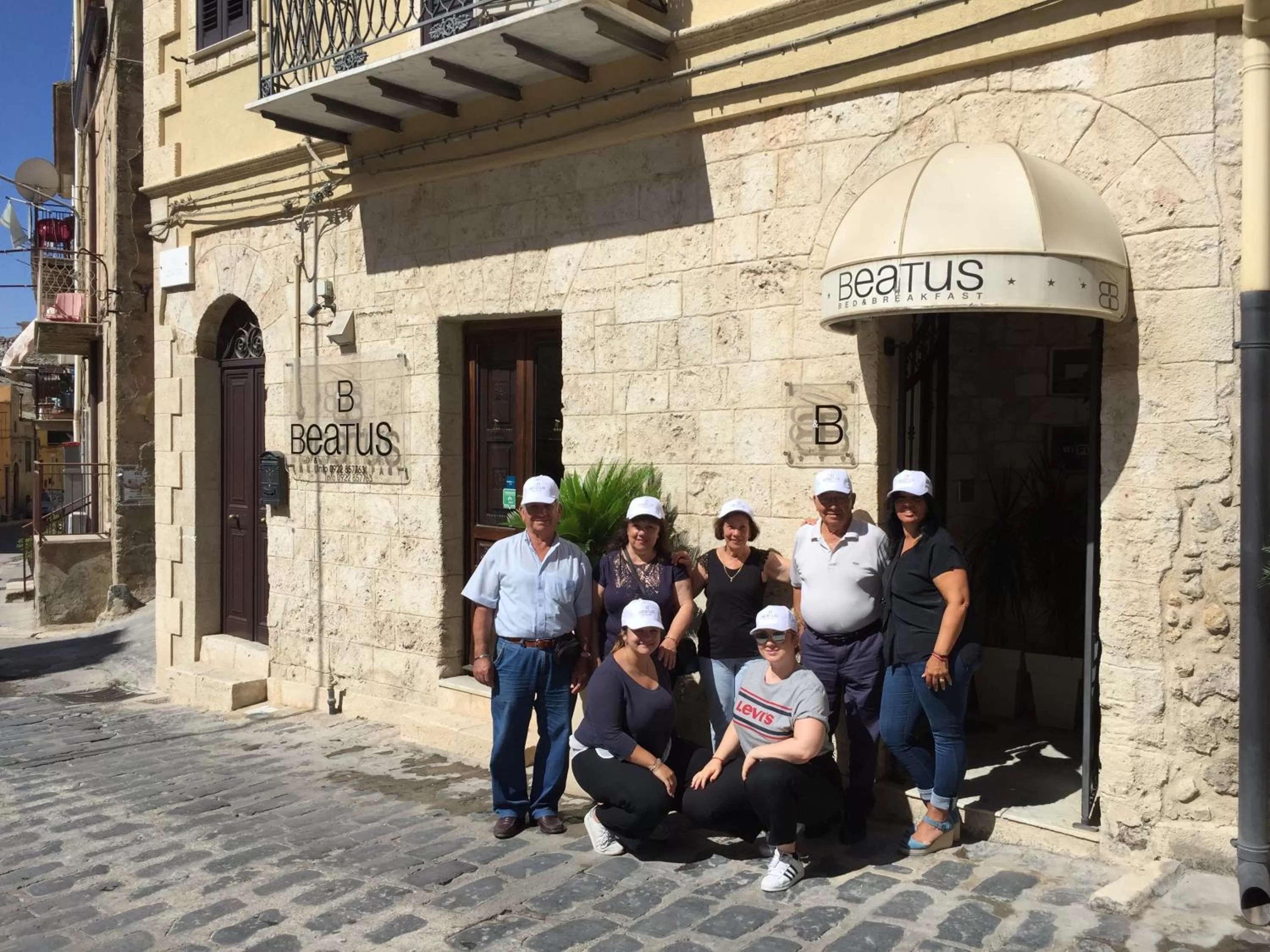 group of guests in Beatus Suites And Rooms B&B