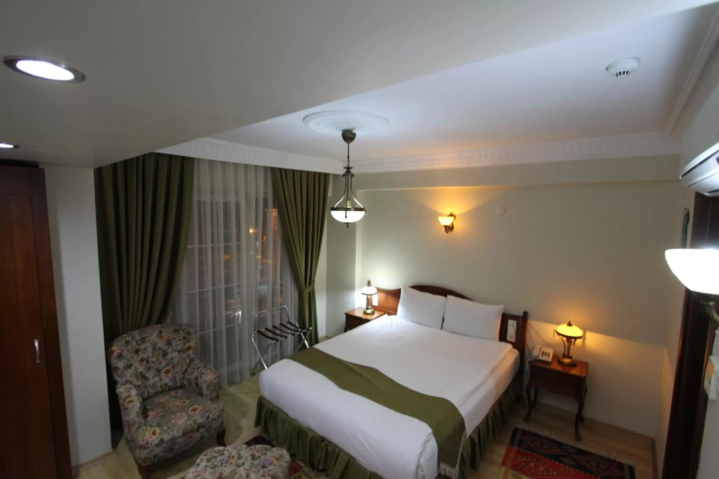 Bed in Basileus Hotel