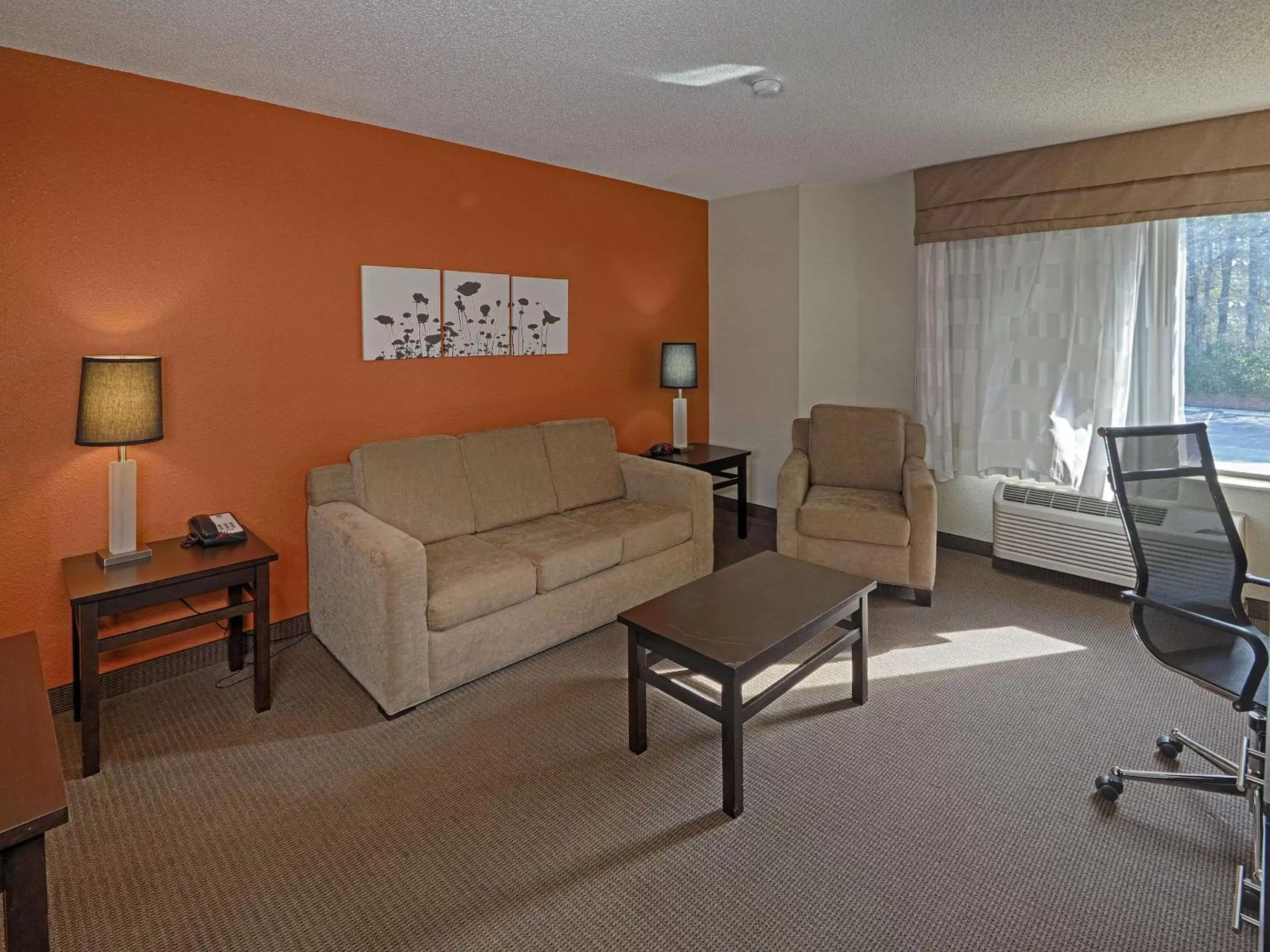 Bedroom, Seating Area in Sleep Inn & Suites Spring Lake - Fayetteville Near Fort Liberty