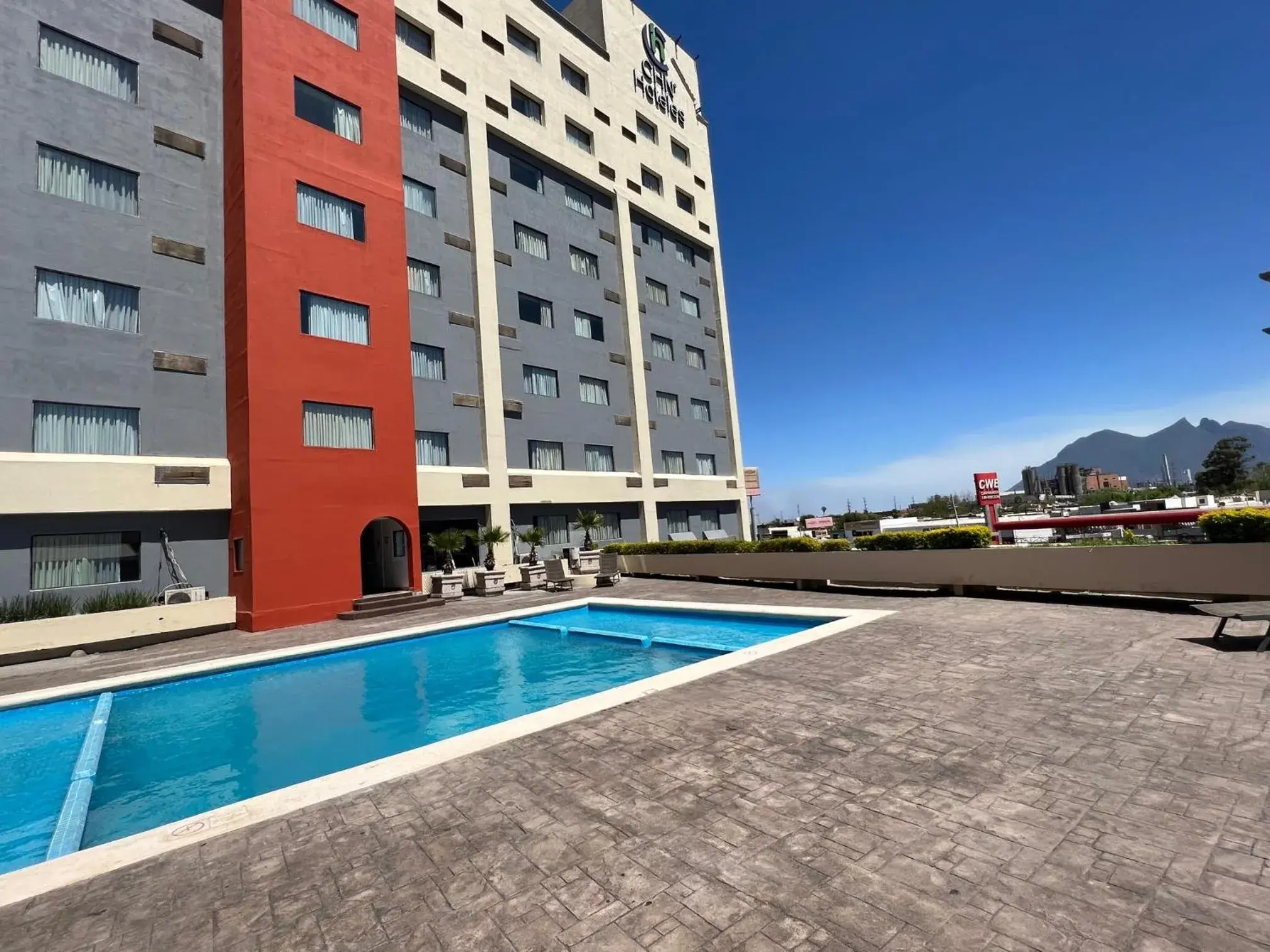 Swimming Pool in CHN Hotel Monterrey Norte, Trademark Collection by Wyndham