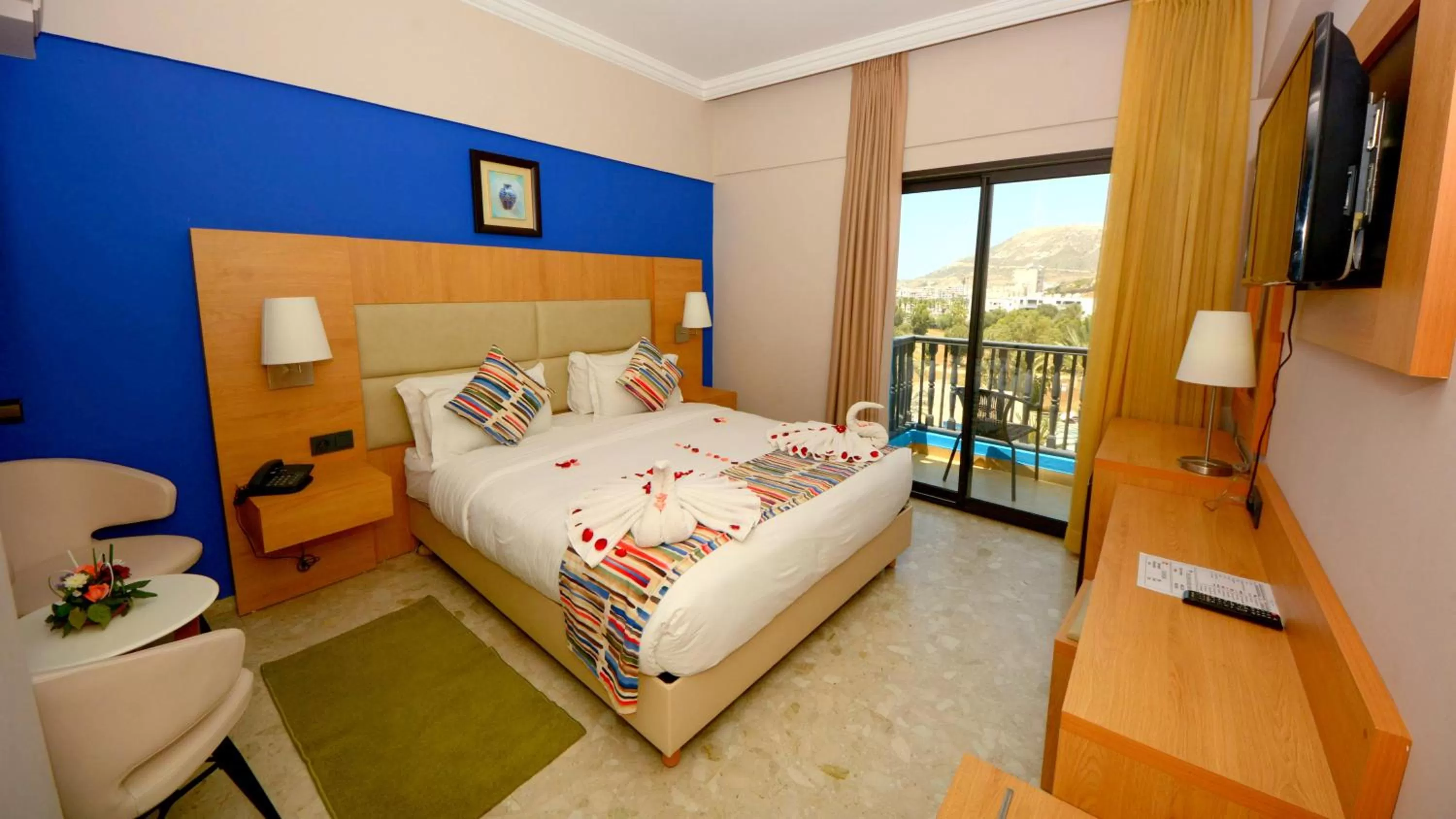 Photo of the whole room, Bed in Oasis Hotel & Spa