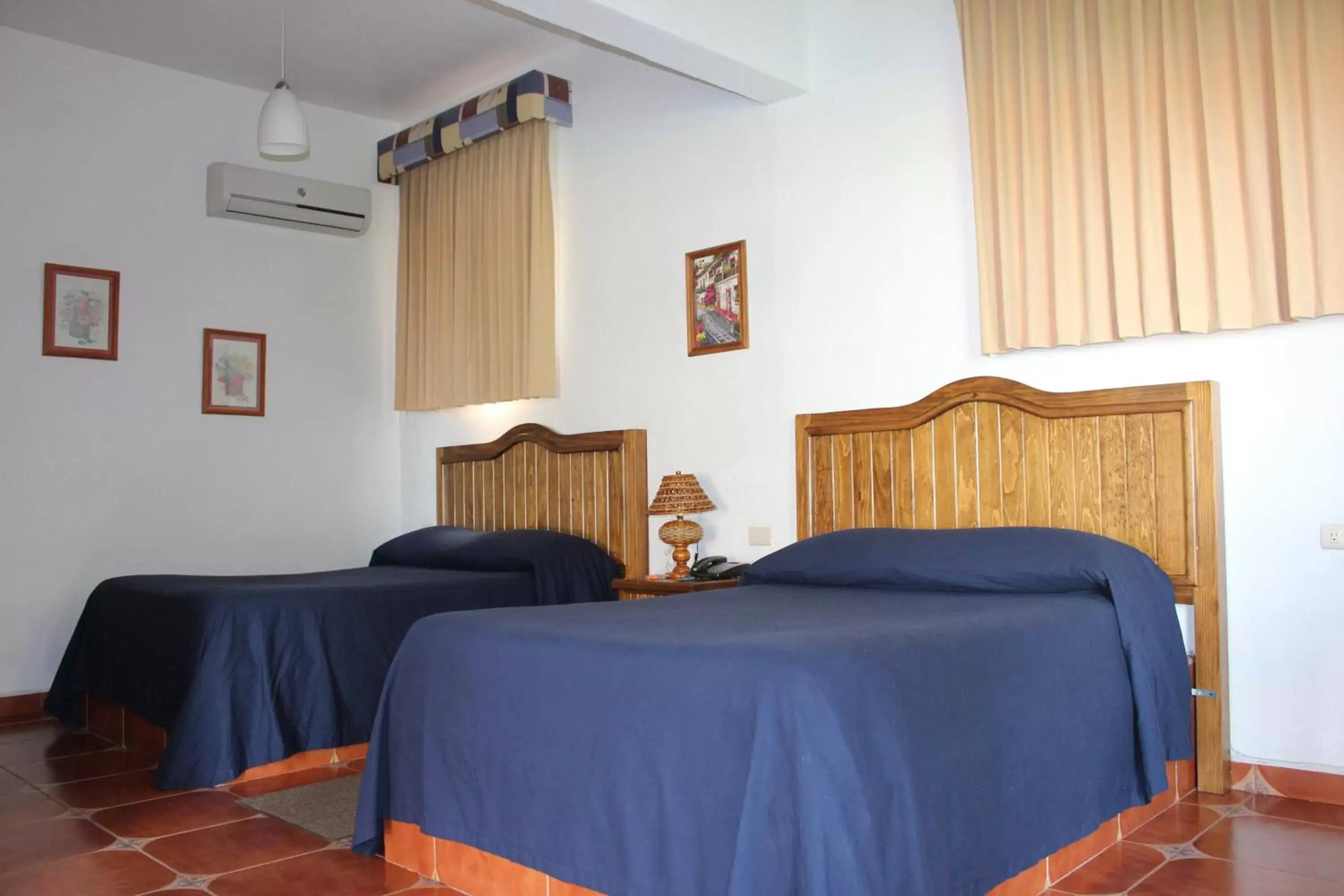 Bed in Hotel La Plaza de Tequisquiapan