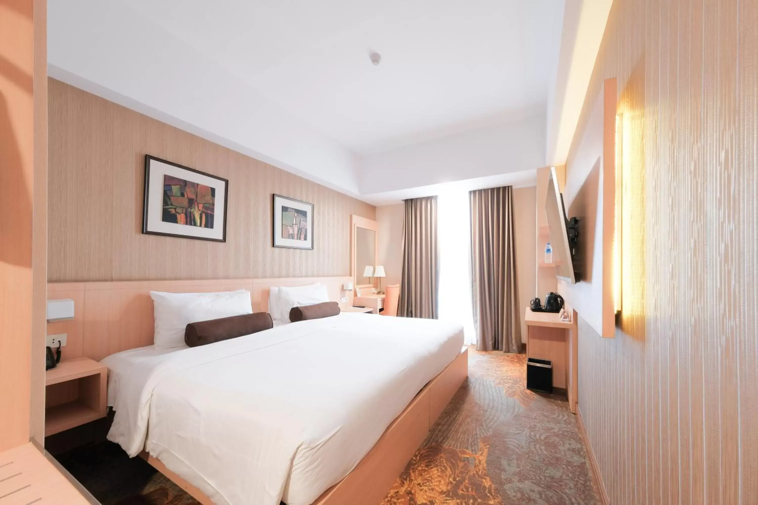 Bed in Hotel Chanti Managed by TENTREM Hotel Management Indonesia