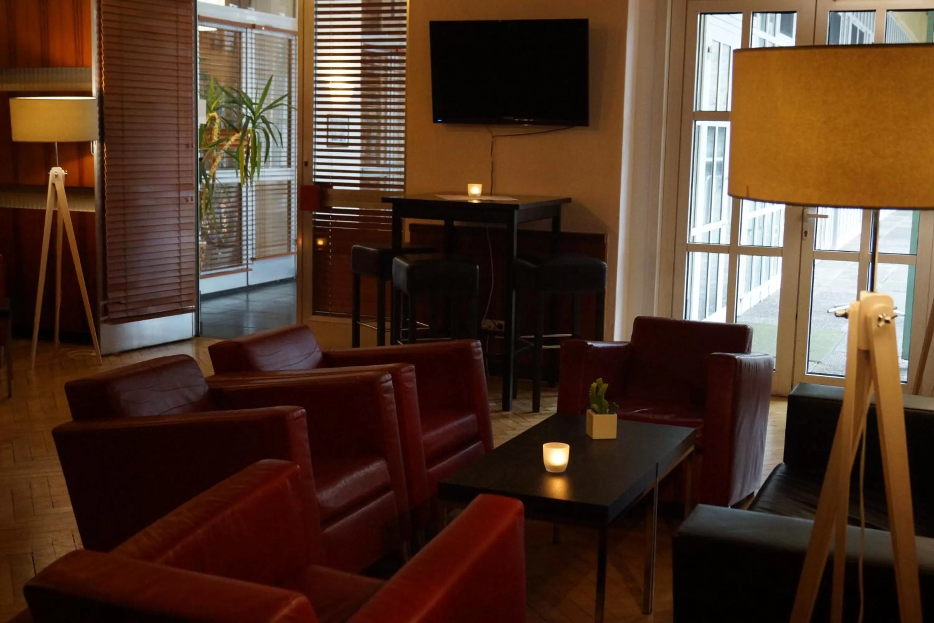 Communal lounge/ TV room in Waldhotel am See Berlin-Schmöckwitz