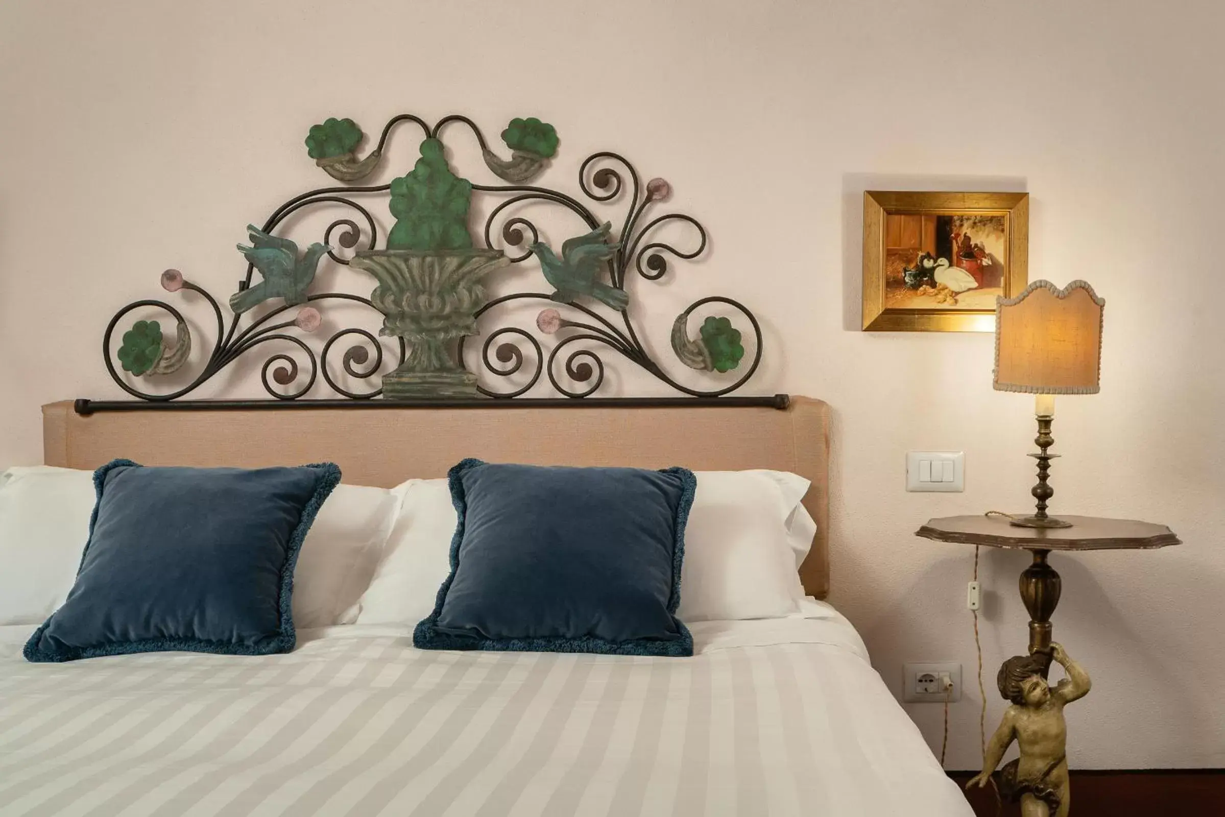 Bed in Bellezza Suites