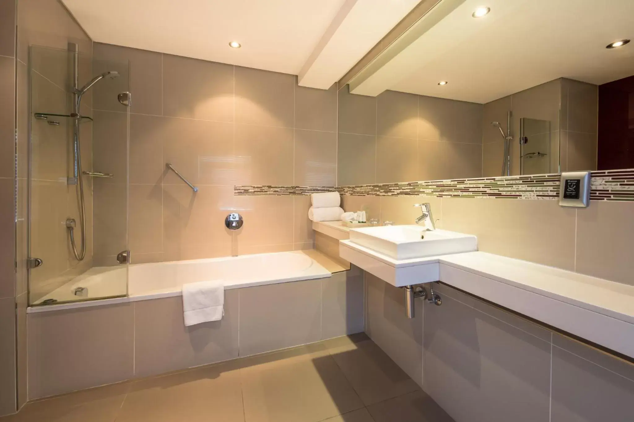 Bathroom in Holiday Inn Johannesburg-Rosebank, an IHG Hotel