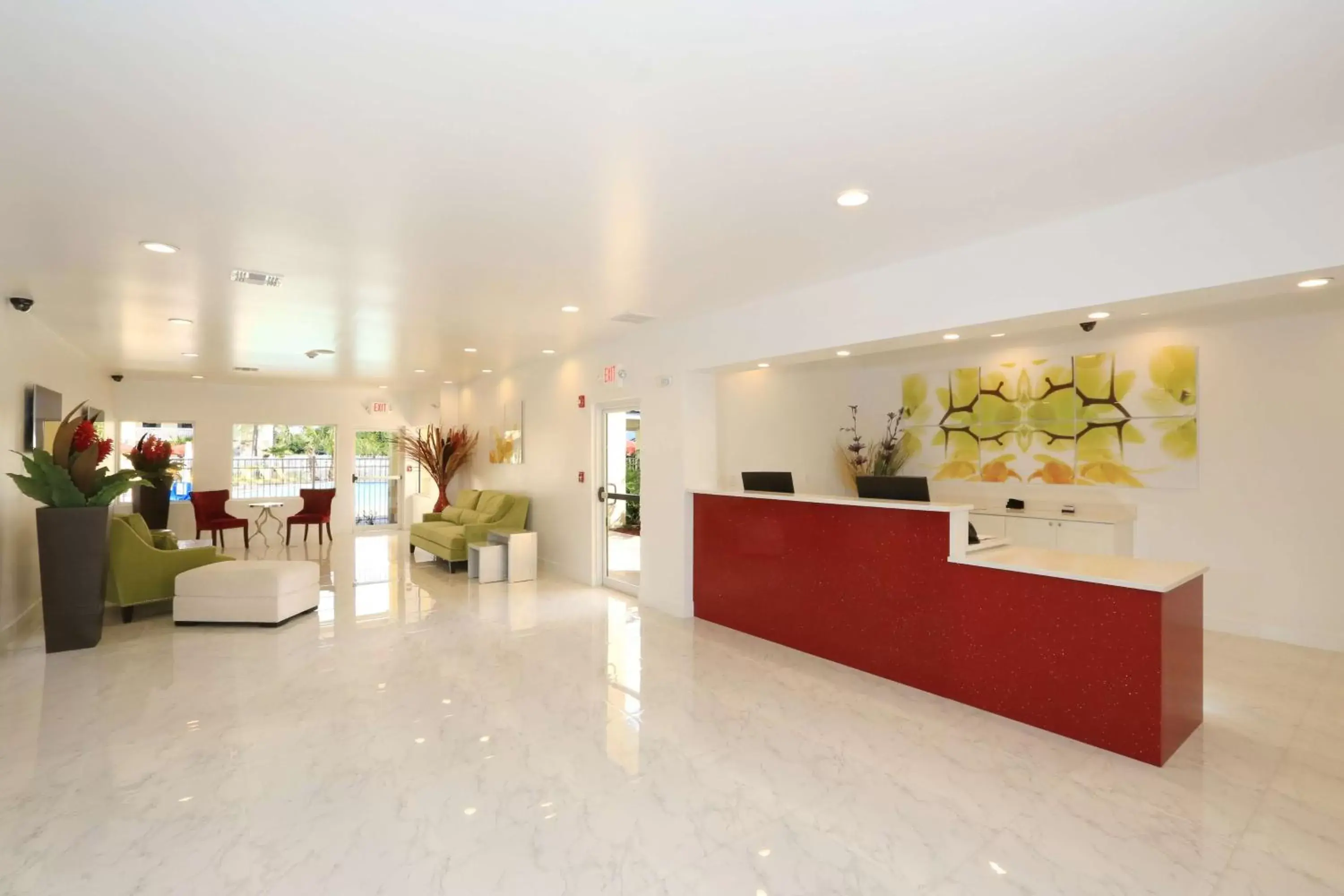 Lobby or reception in SureStay Plus by Best Western Orlando International Drive