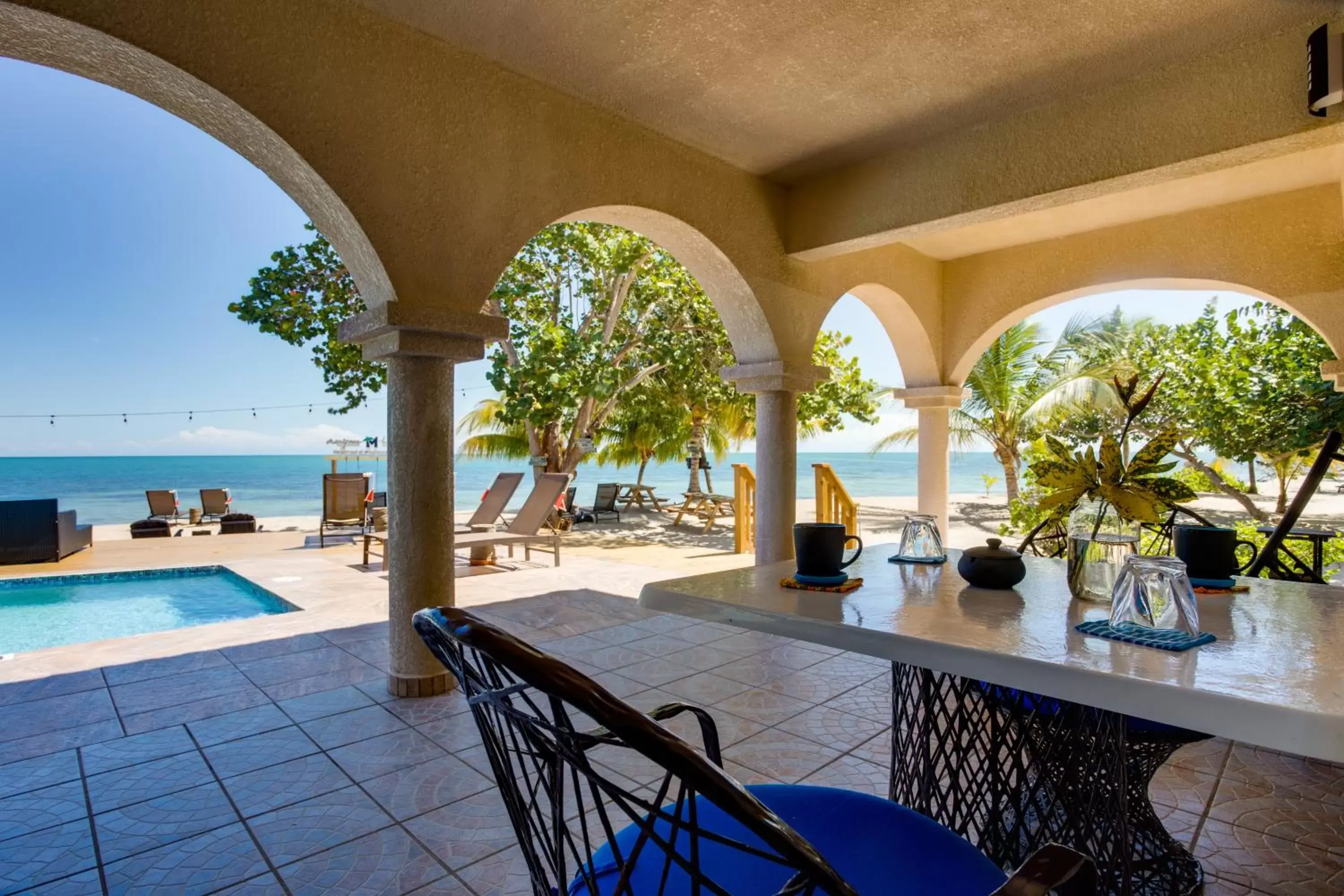 Patio, Swimming Pool in Mariposa Belize Beach Resort