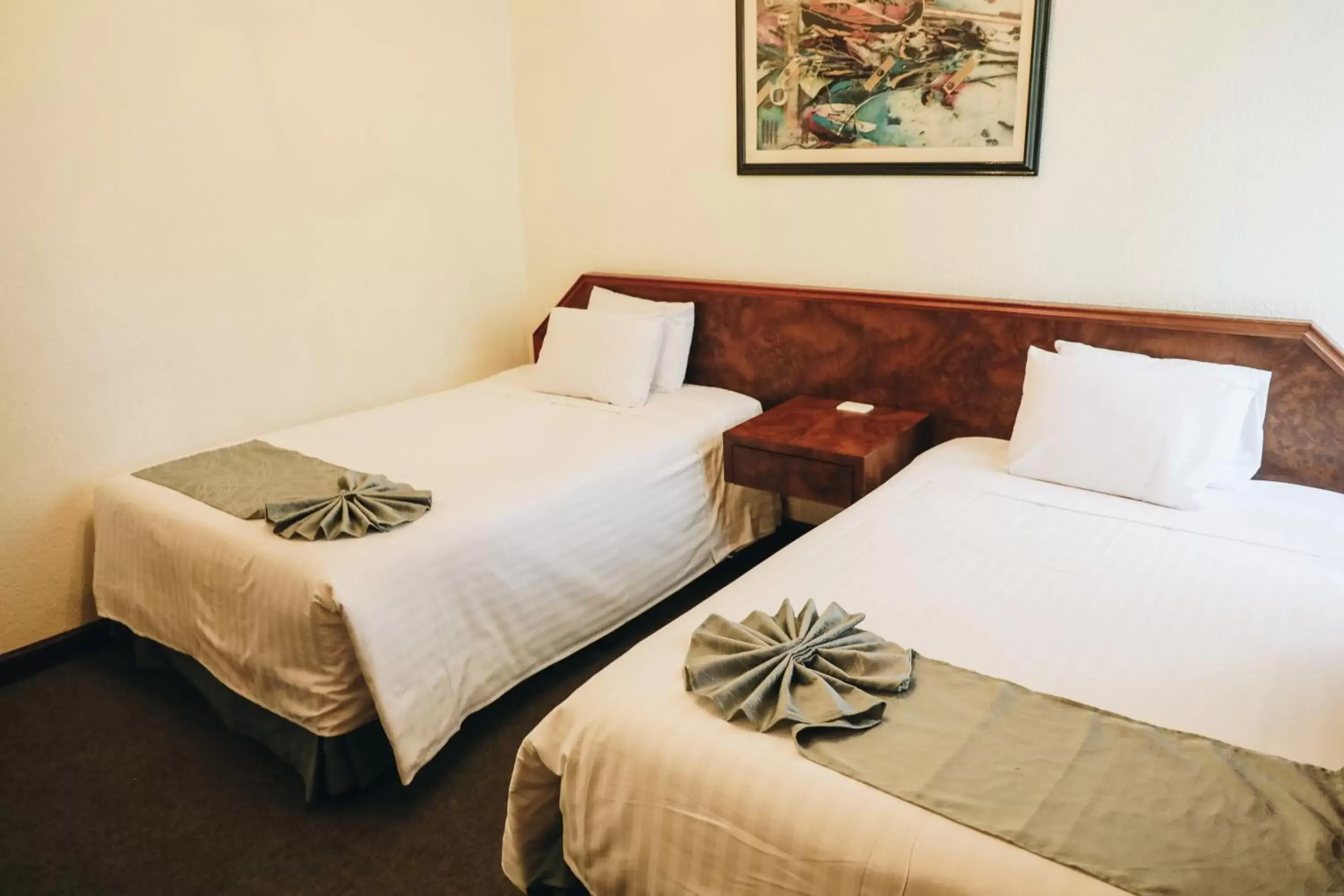 Bed in Hotel La Joya Tulancingo