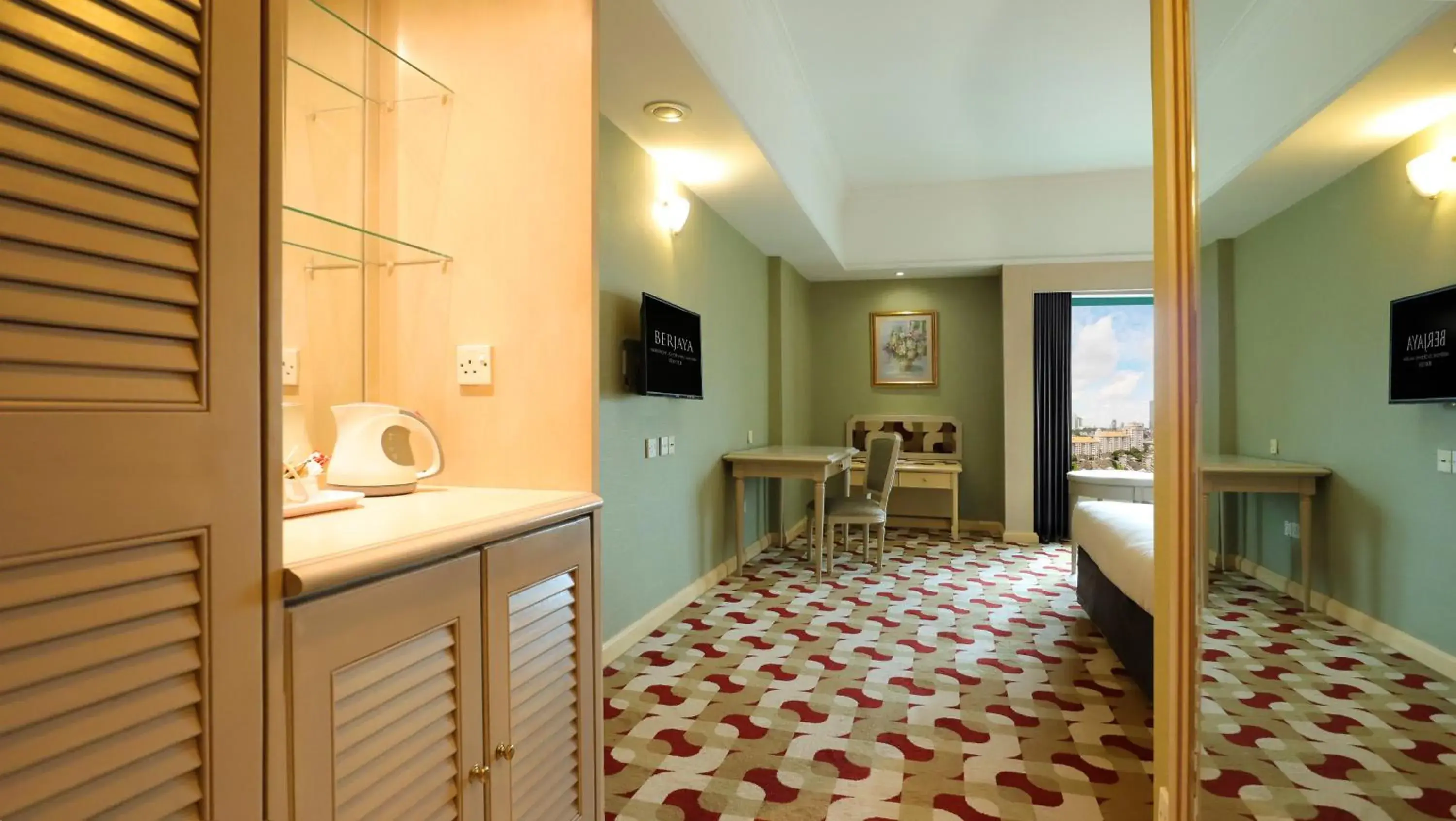 Bed, TV/Entertainment Center in Berjaya Waterfront Hotel