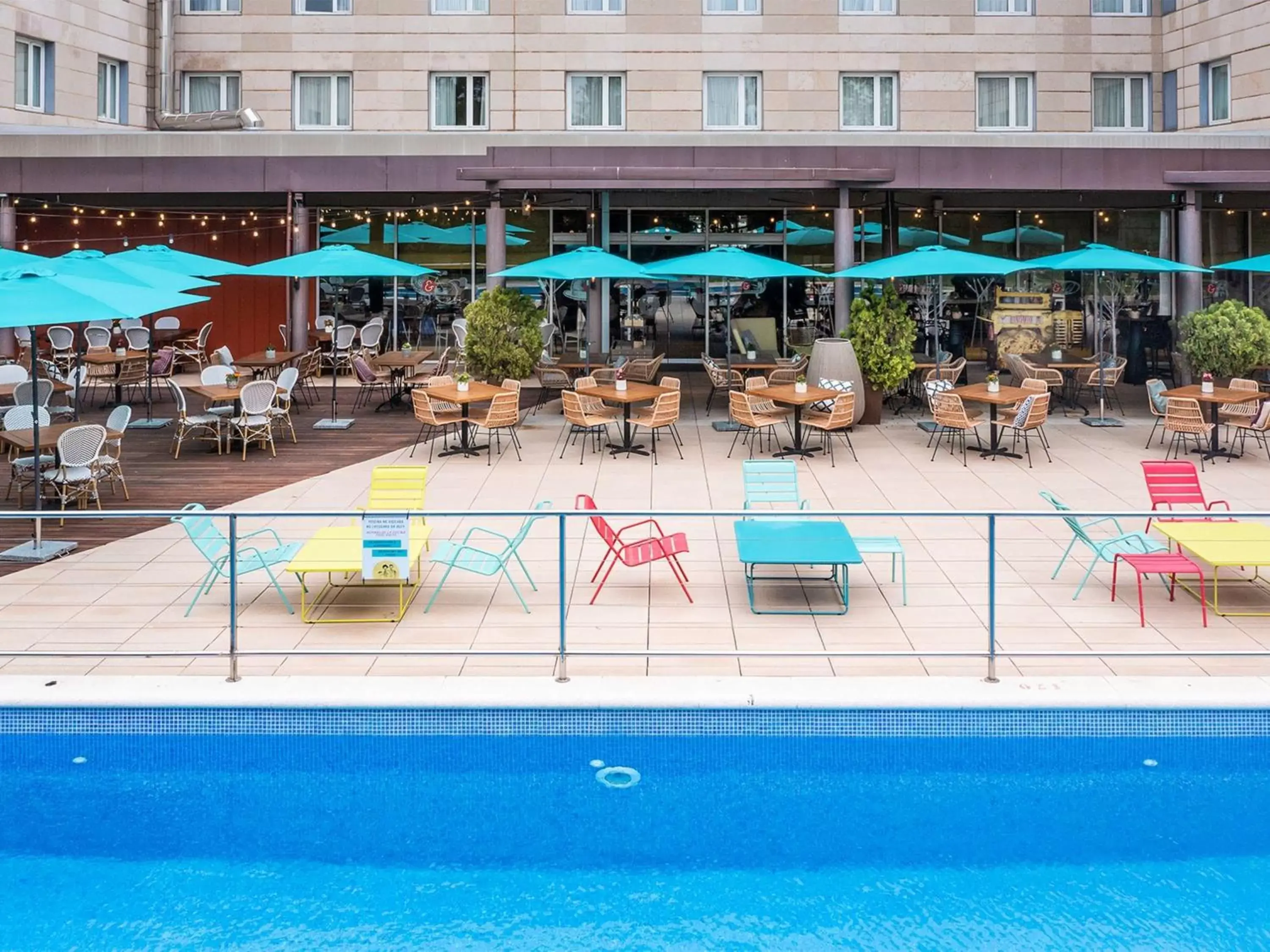 Property building, Swimming Pool in Novotel Barcelona Cornellà