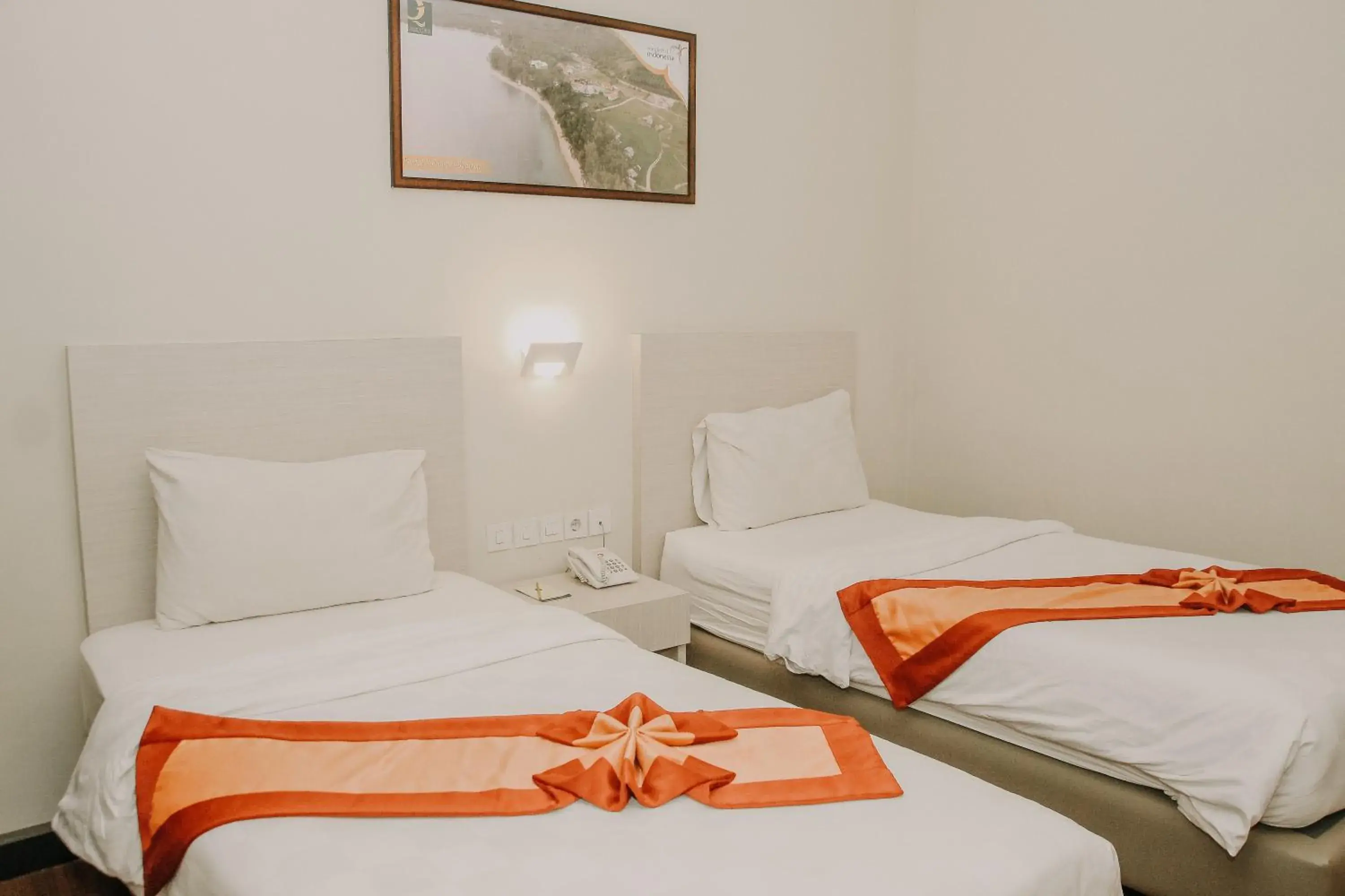 Bed in Grand Q Hotel Gorontalo