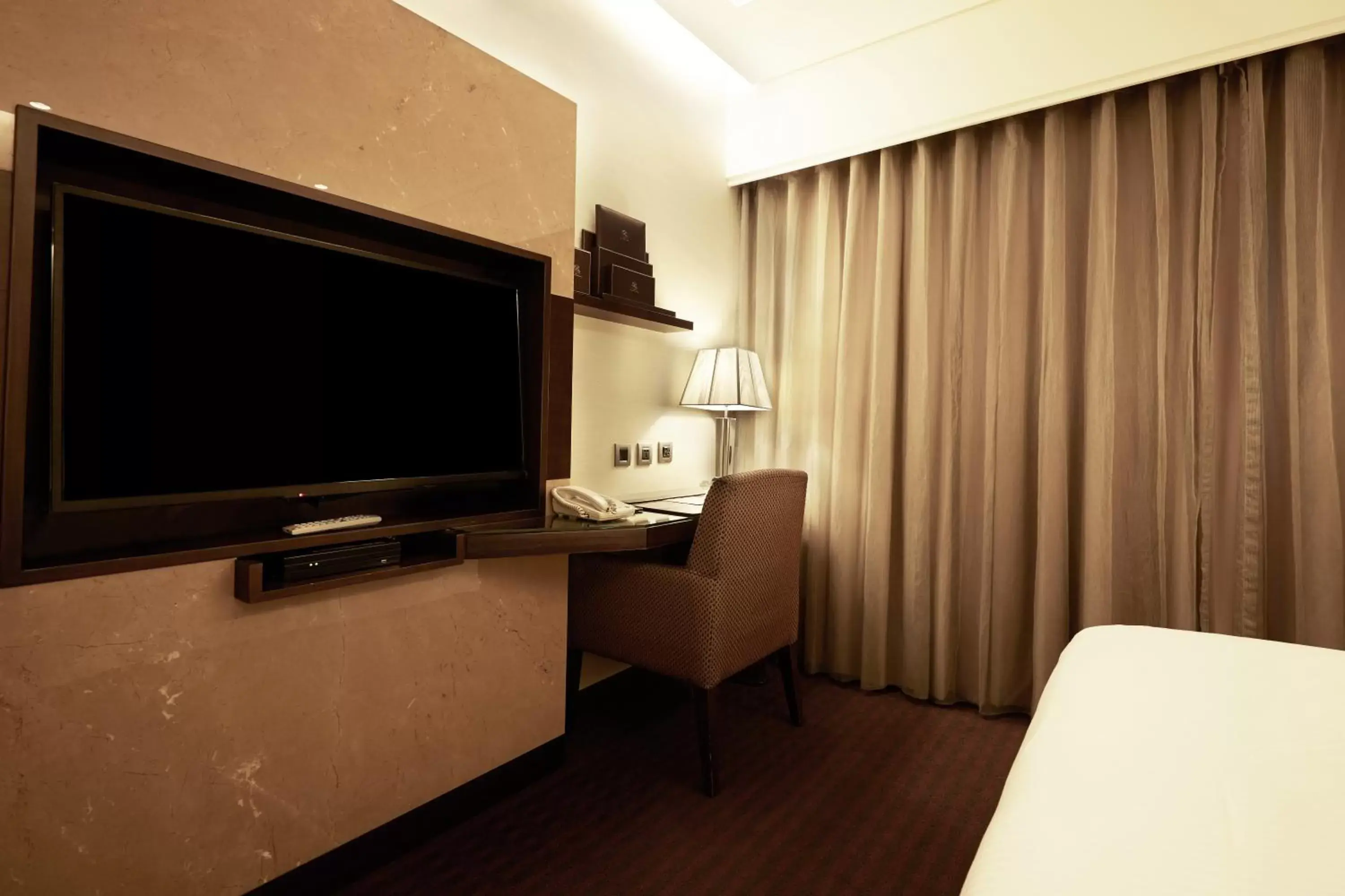 TV and multimedia, TV/Entertainment Center in Beauty Hotels - Roumei Boutique