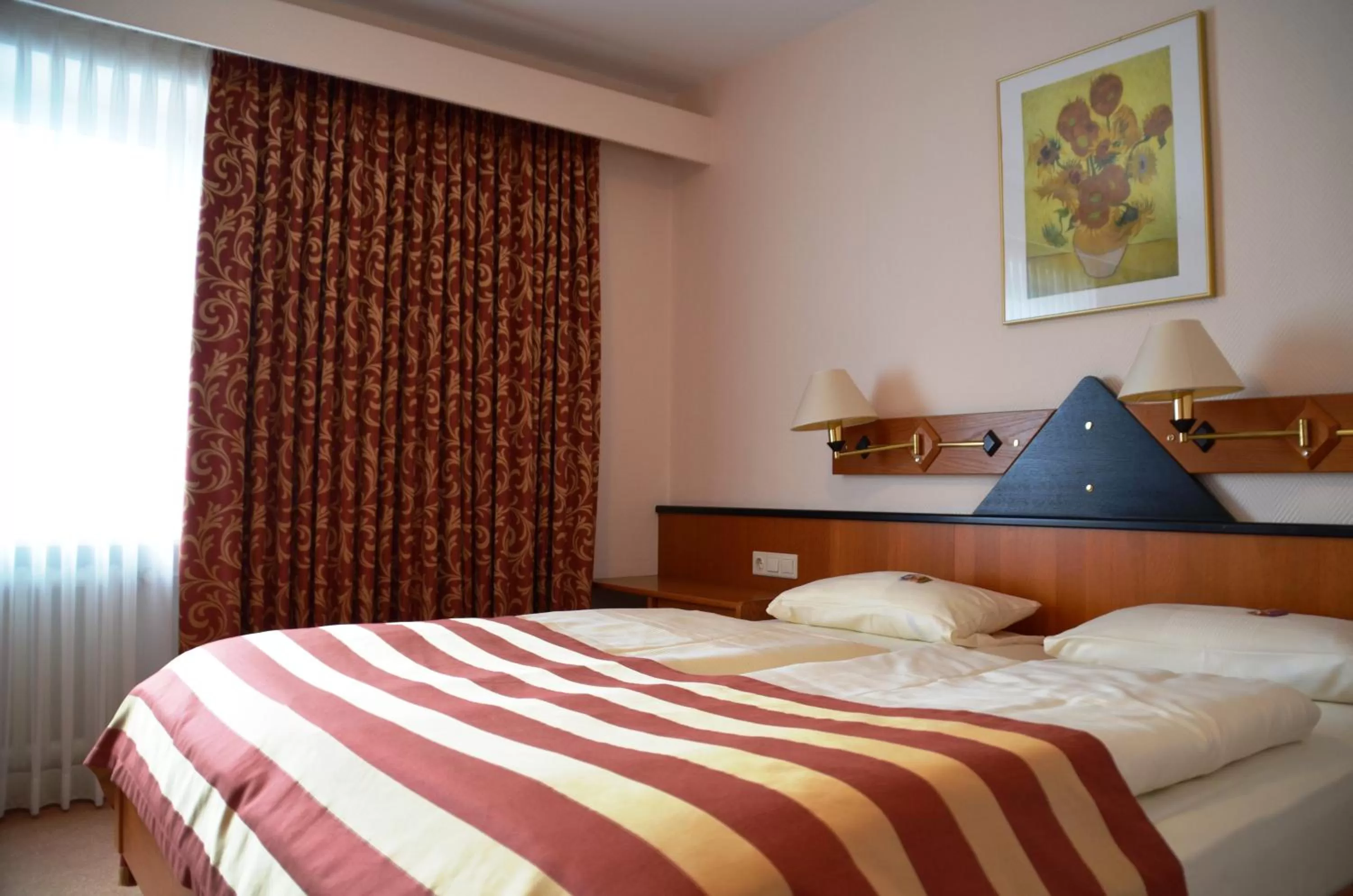 Bed in Hotel Exquisit