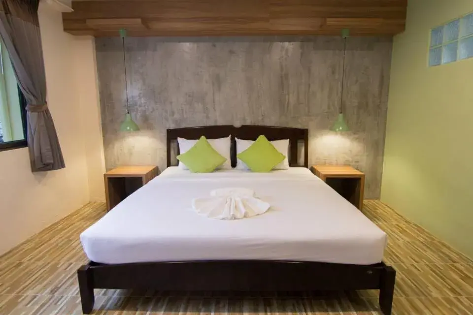 Bed in K.L. Boutique Hotel