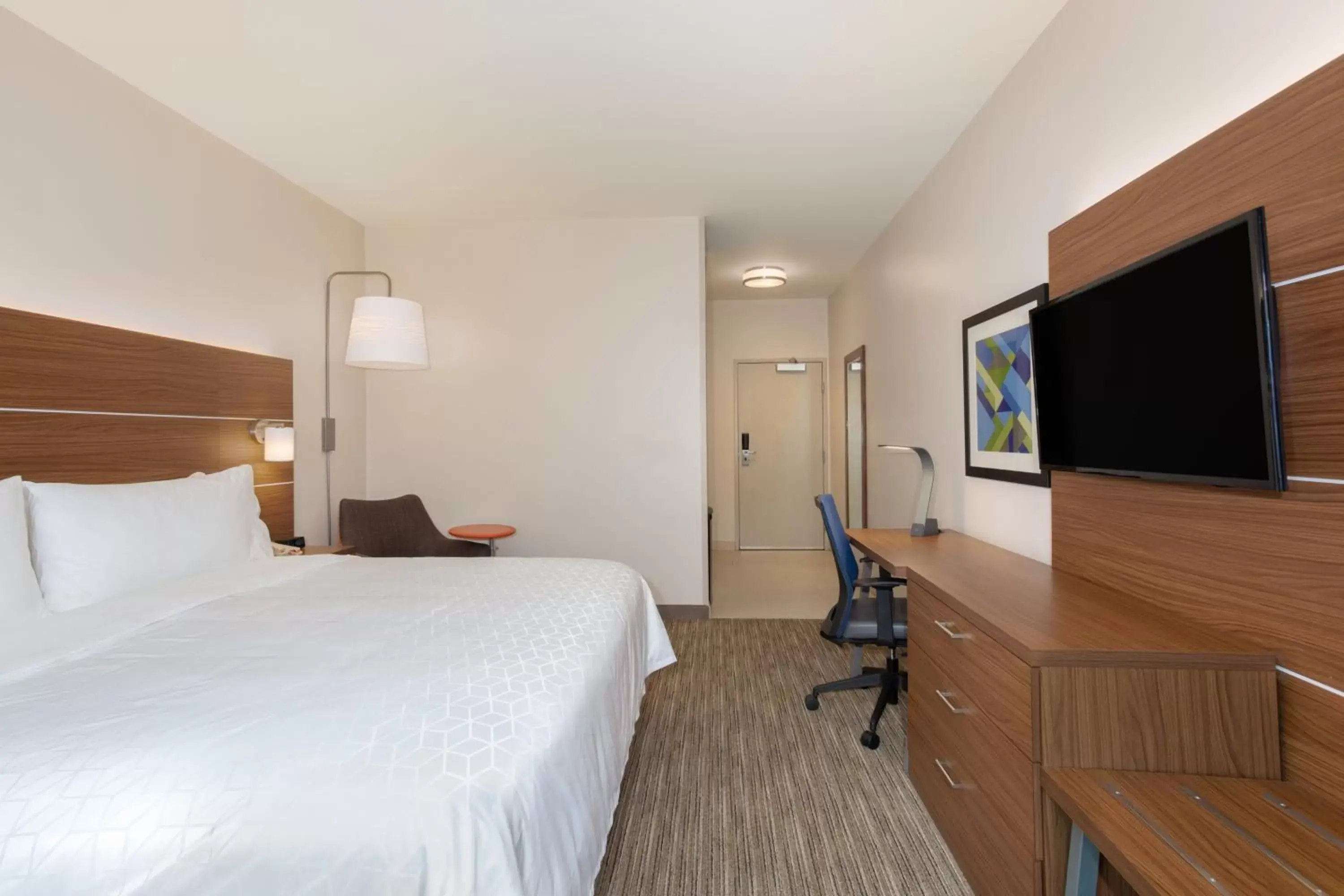 Photo of the whole room, TV/Entertainment Center in Sleep Inn & Suites Tempe ASU Campus
