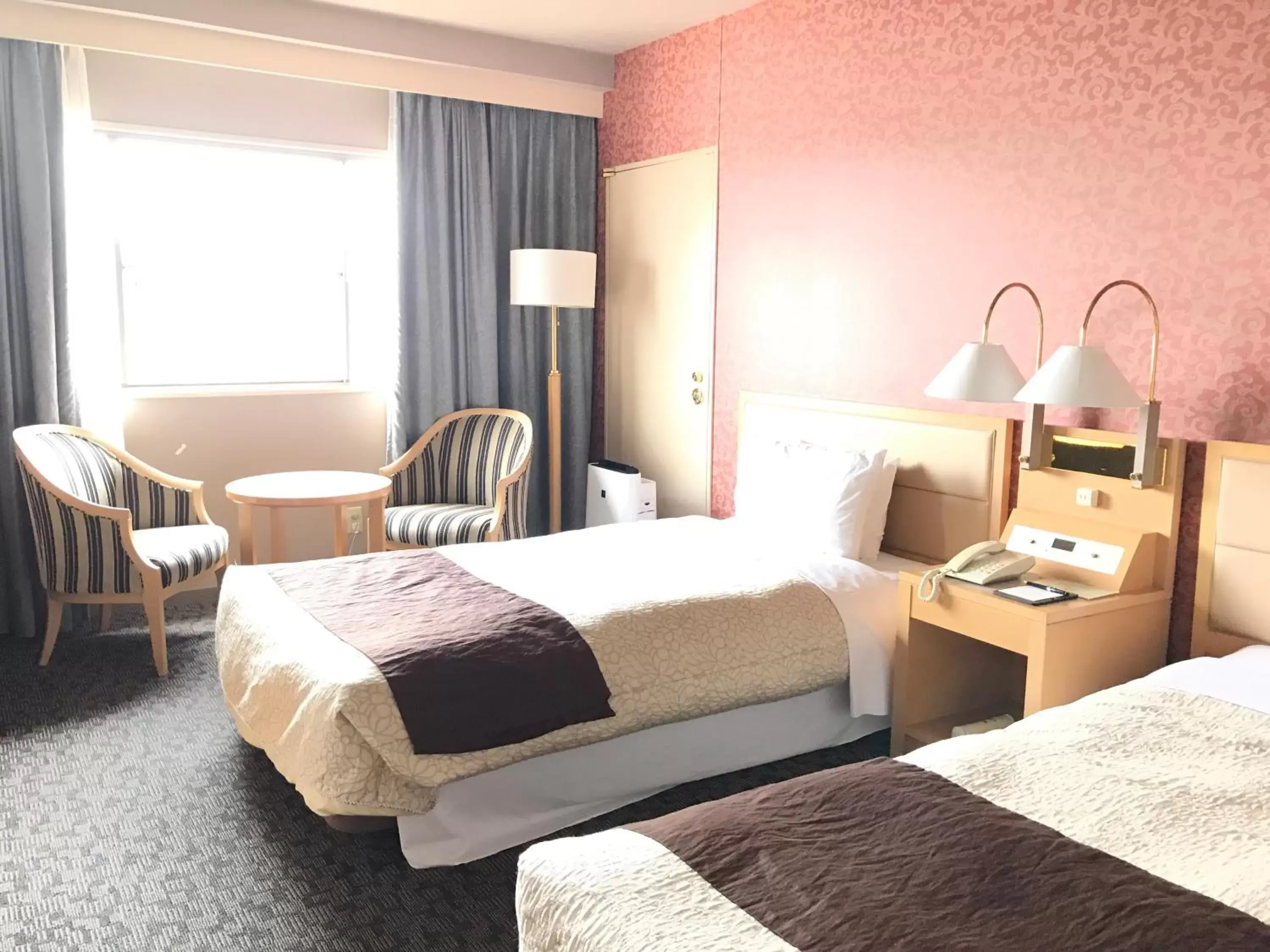 Bed in Numazu River Side Hotel