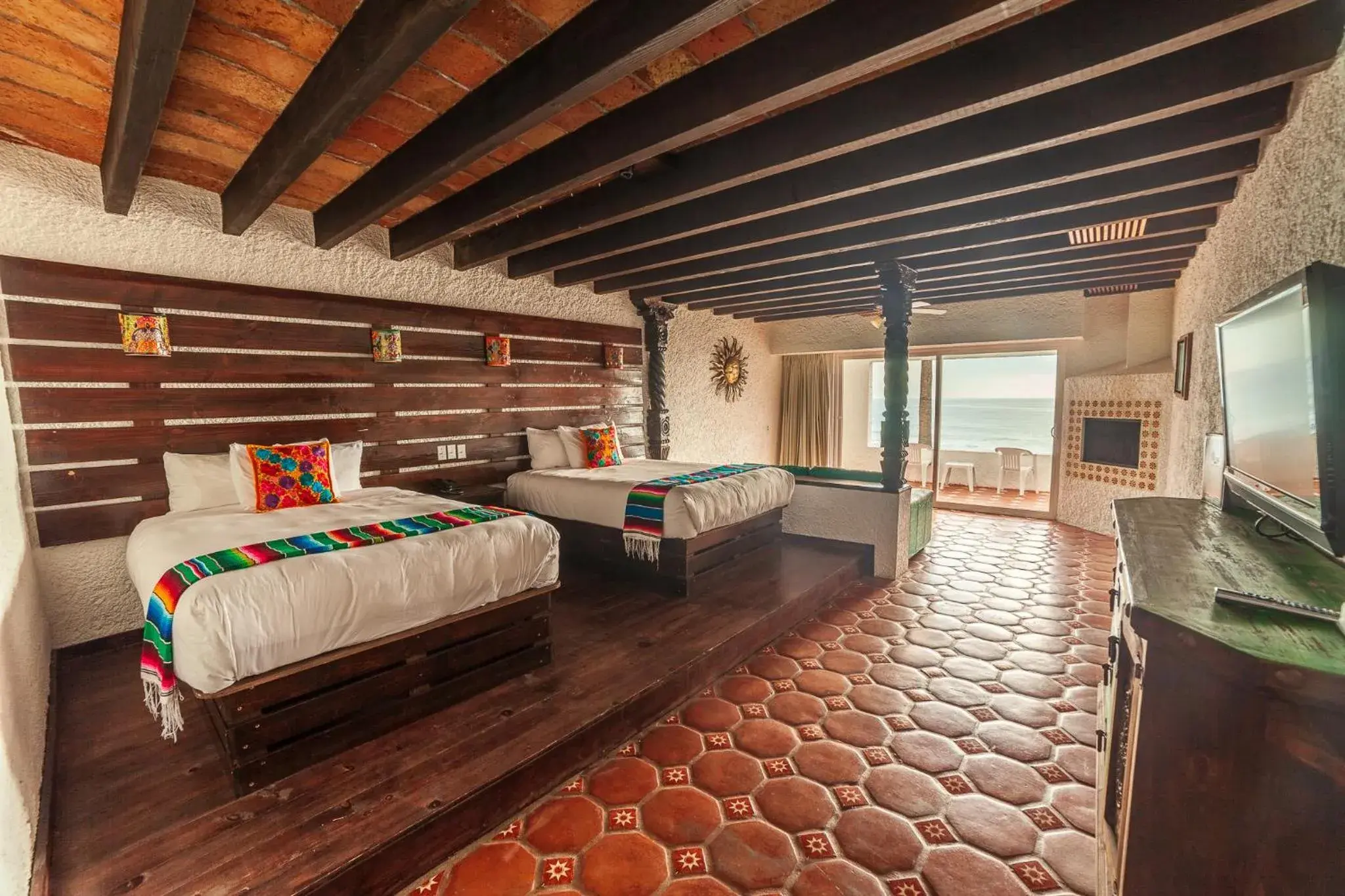 Bed in Las Rocas Resort & Spa Bed in Las Rocas Resort & Spa