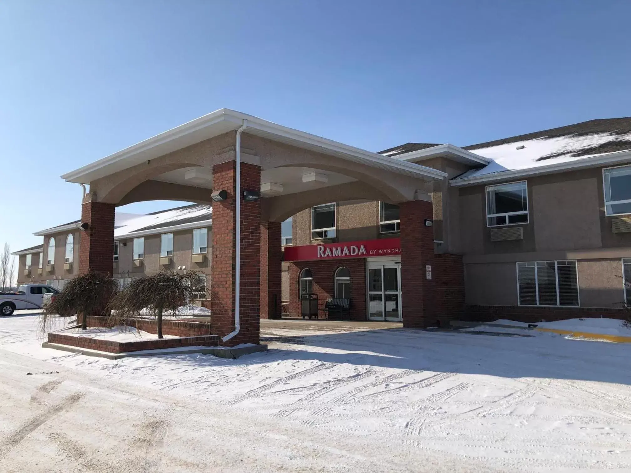 Property building, Winter in Ramada by Wyndham Ponoka