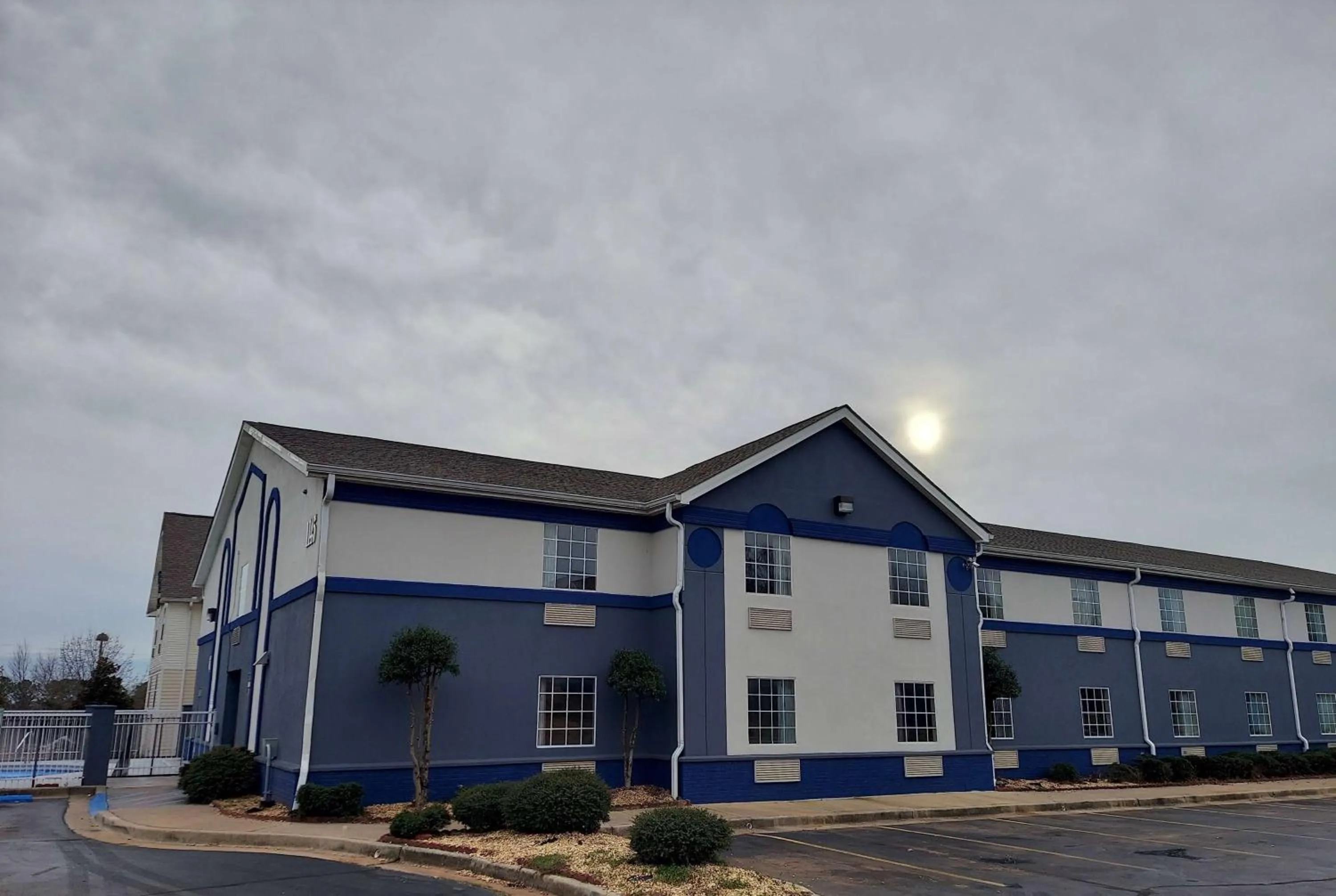 Property building in Days Inn & Suites by Wyndham Huntsville