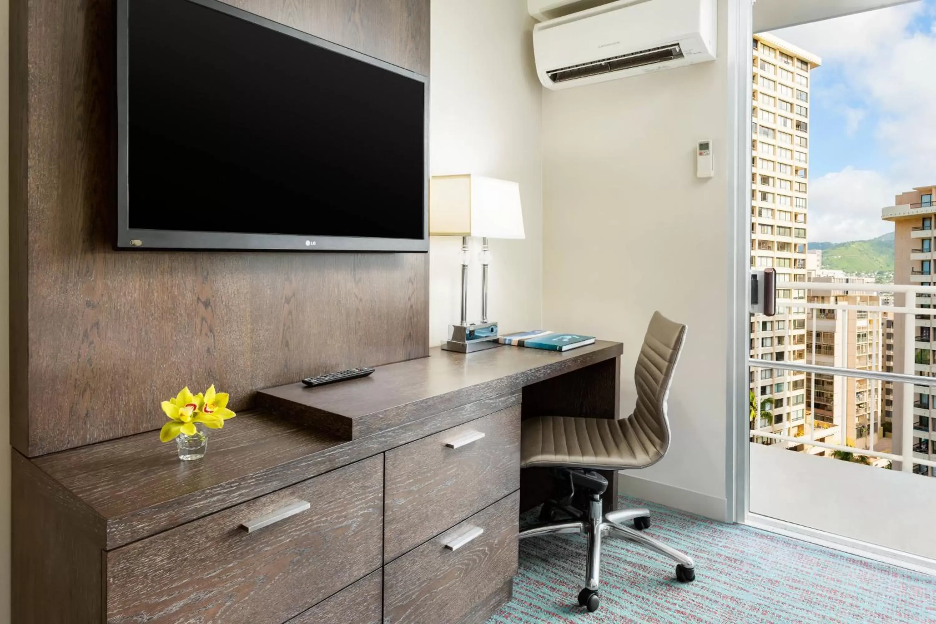 Photo of the whole room, TV/Entertainment Center in Courtyard by Marriott Waikiki Beach