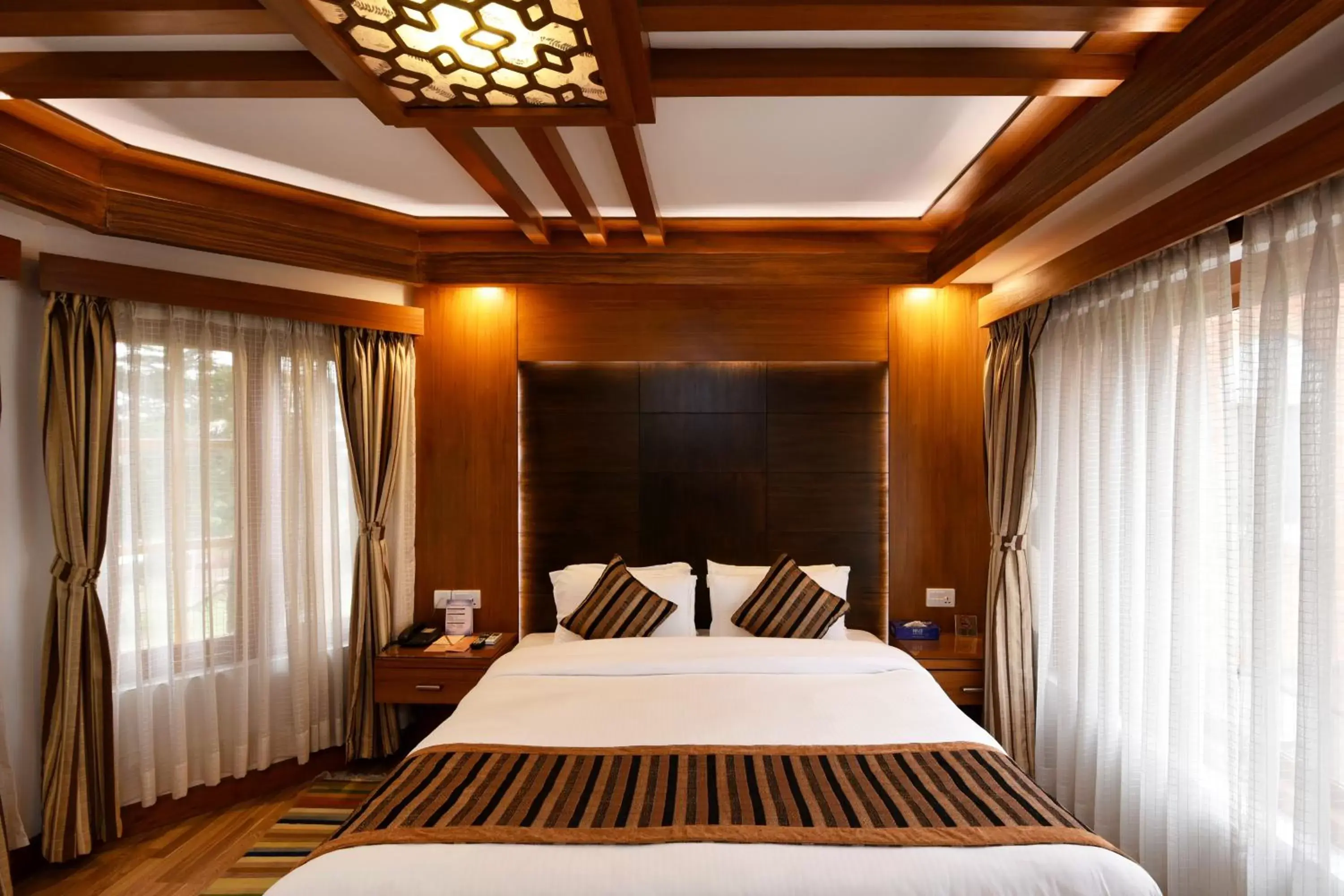 Bedroom, Bed in Park Village Resort by KGH Group
