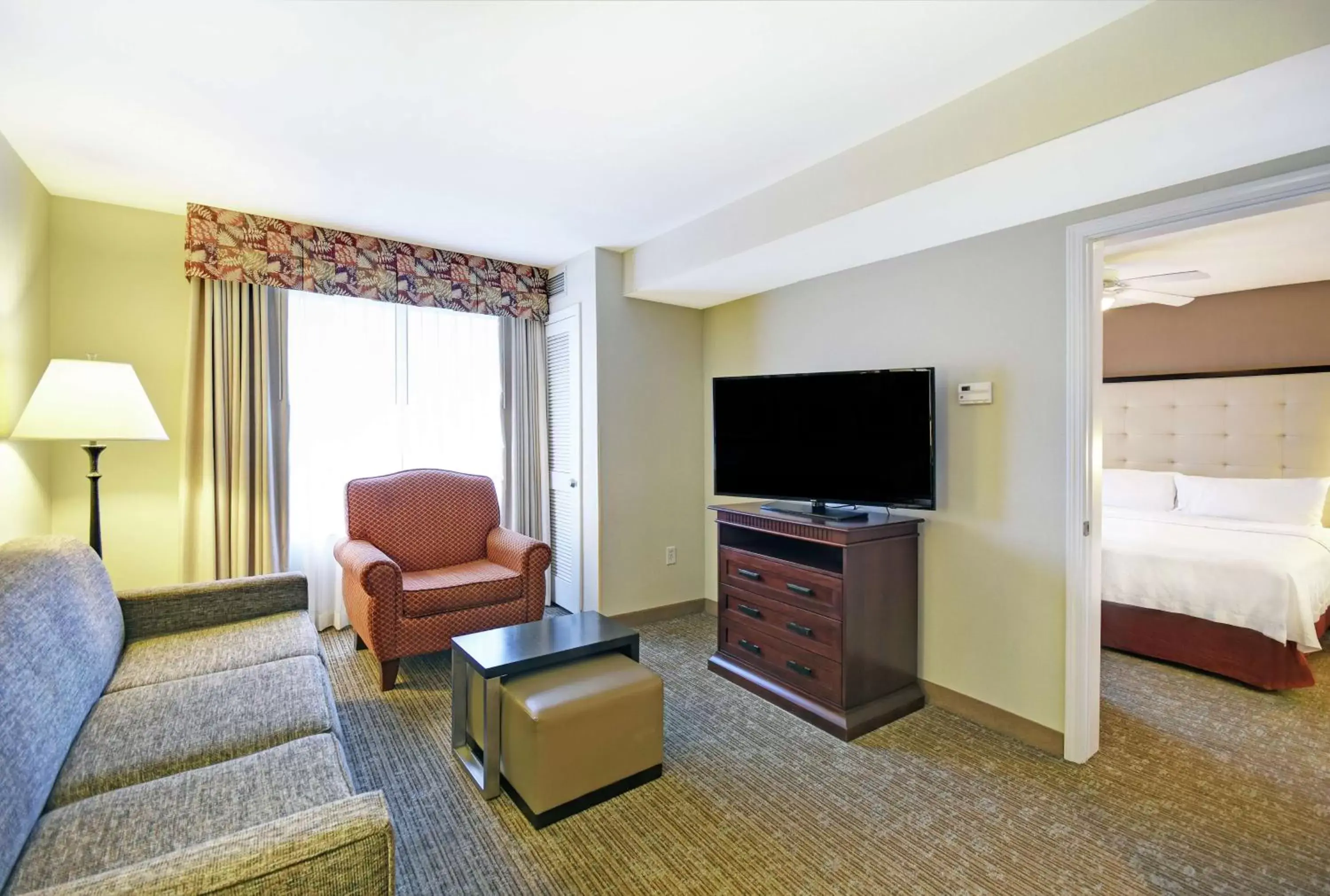Bedroom, TV/Entertainment Center in Homewood Suites by Hilton Denver International Airport