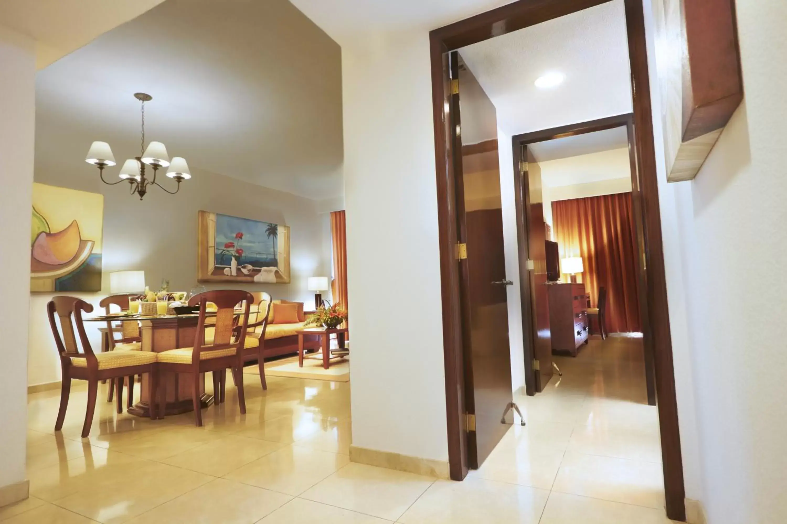 Living room, Restaurant/Places to Eat in The Villas at The Royal Cancun - All Suites Resort