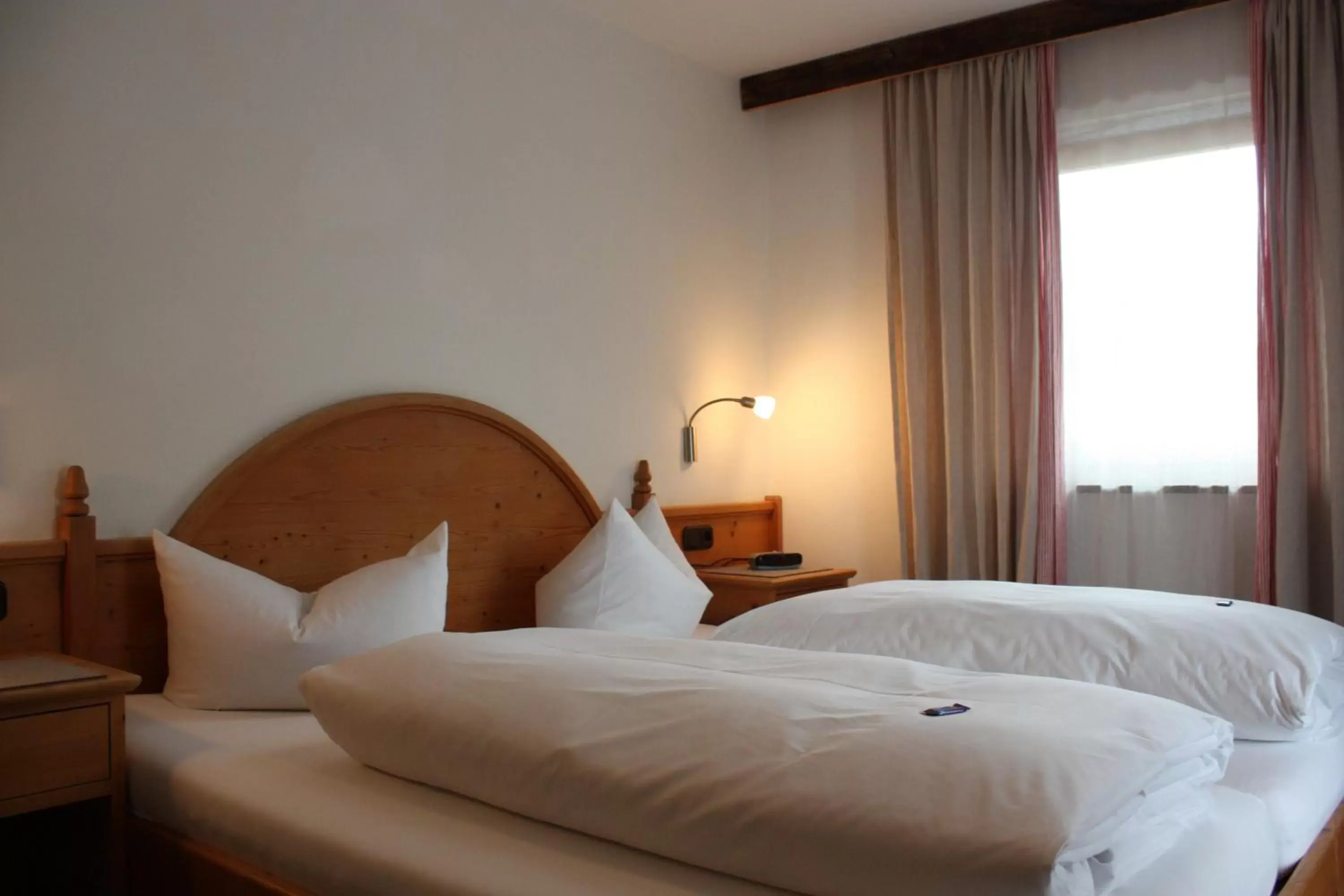 Bed in Das Posch Hotel