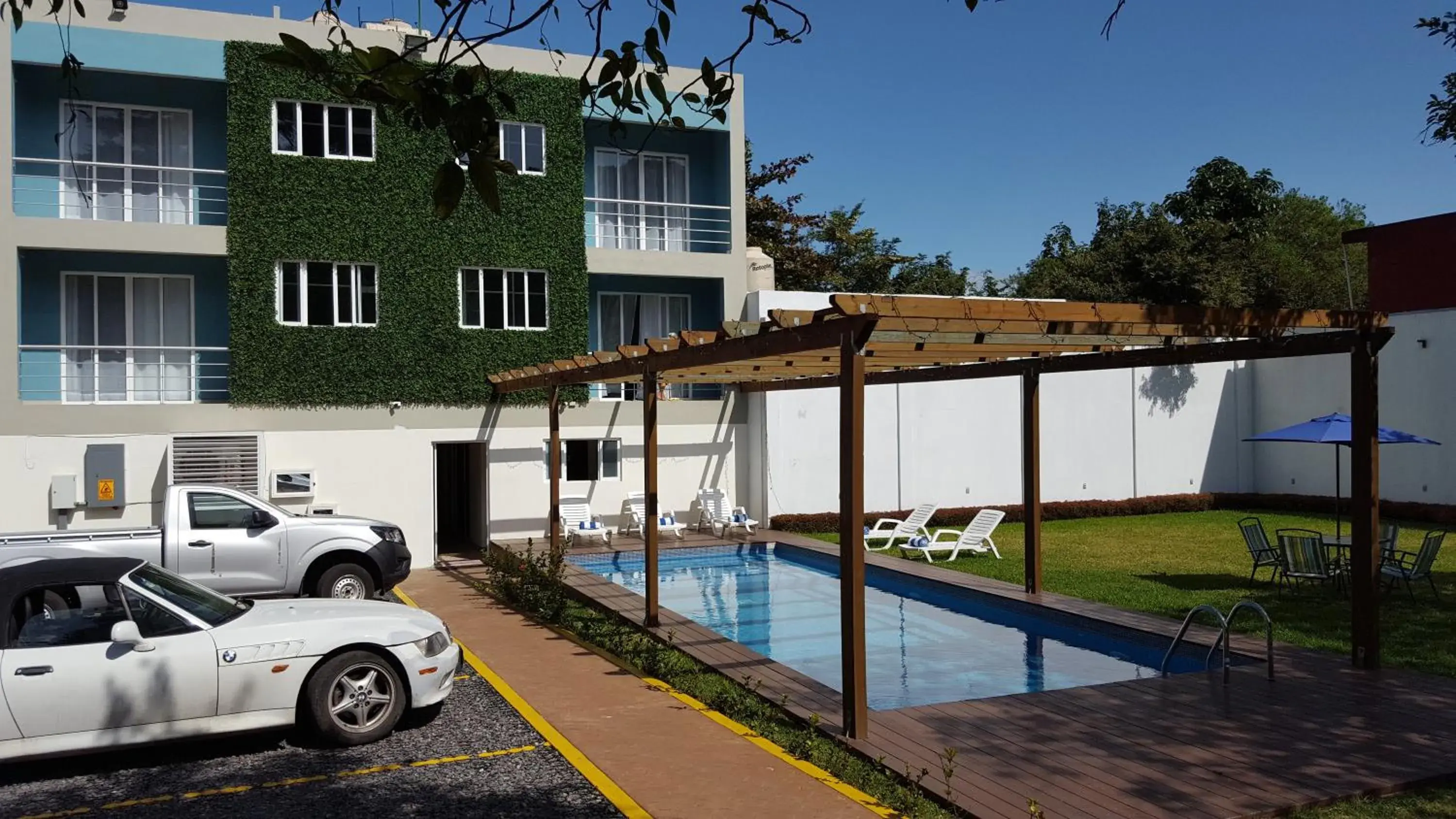 Property building, Swimming Pool in Relax Inn Suites