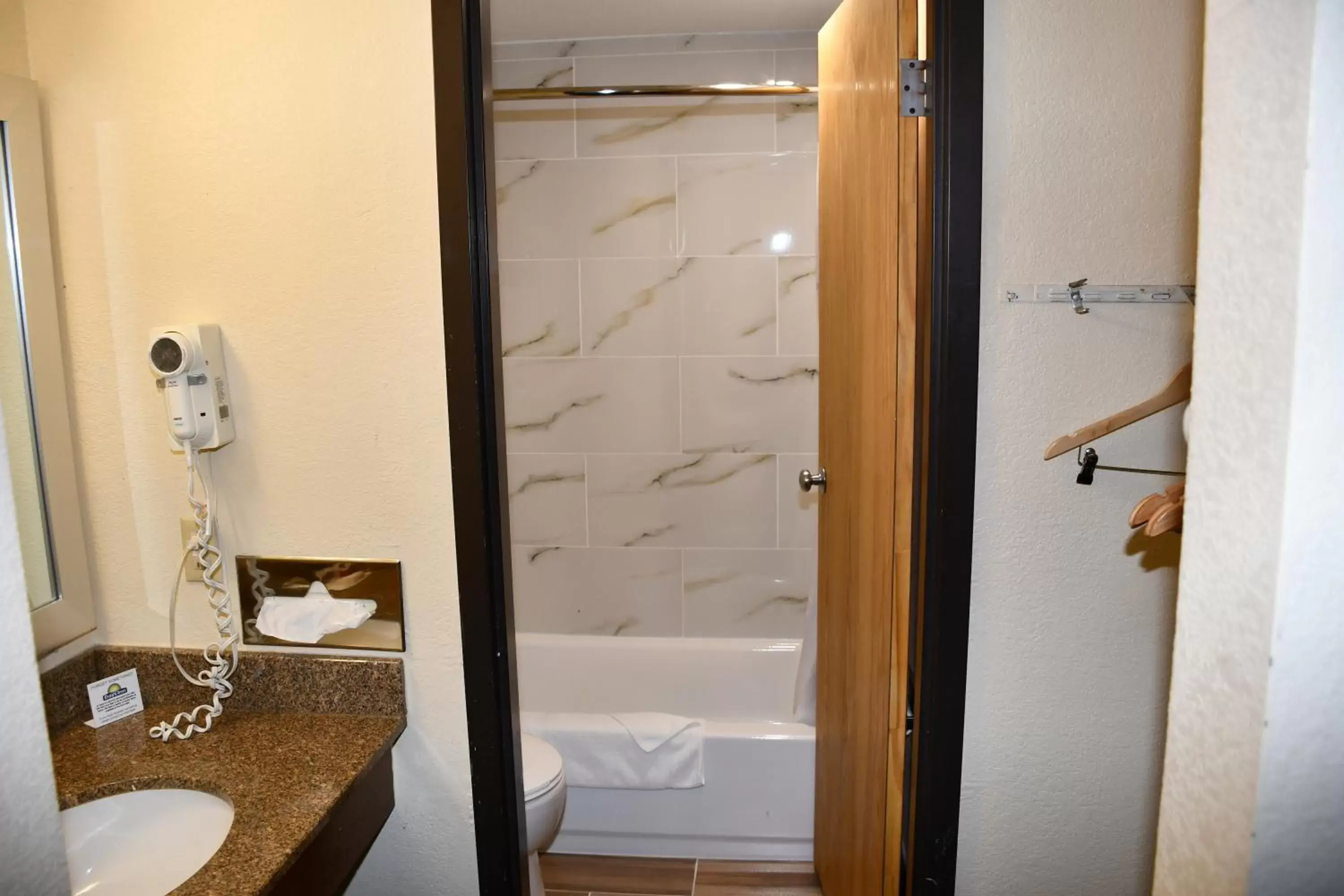 Bathroom in Days Inn by Wyndham Mounds View Twin Cities North