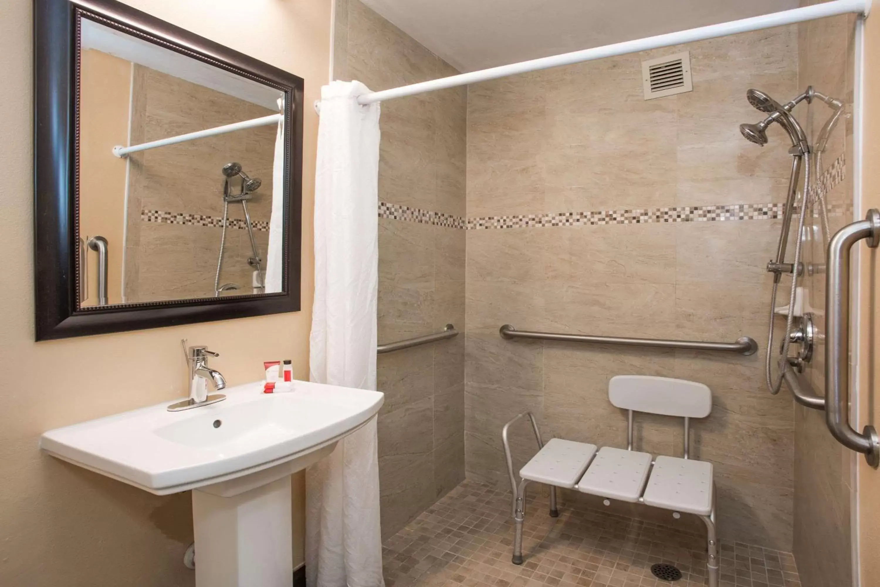 Shower, Bathroom in Days Inn by Wyndham Sarasota Bay