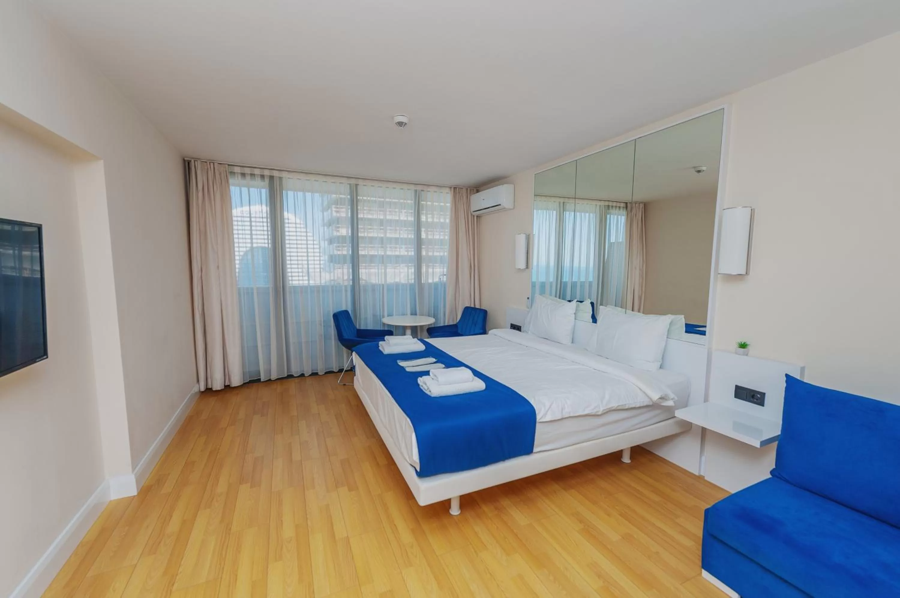 Bed in Orbi City Luxury Suite