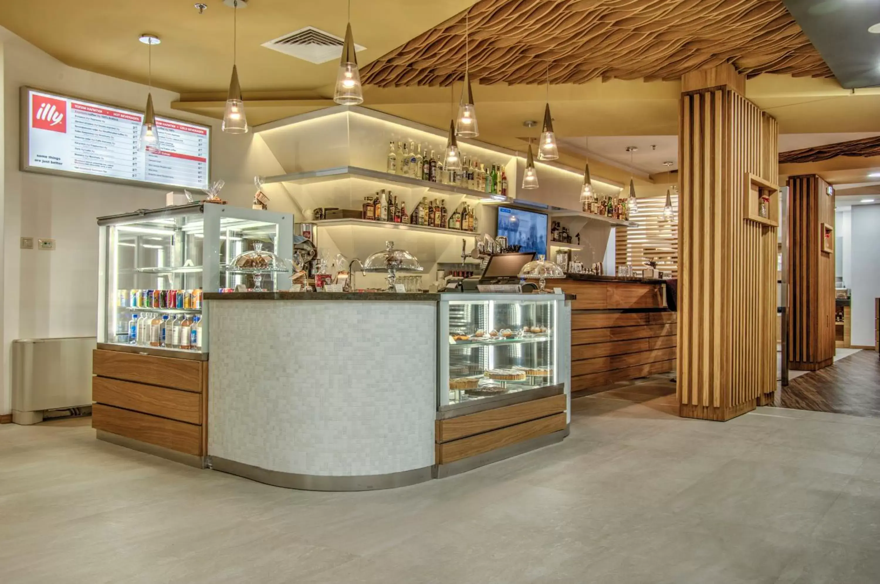 Lounge or bar in Holiday Inn Plovdiv by IHG Lounge or bar in Holiday Inn Plovdiv by IHG