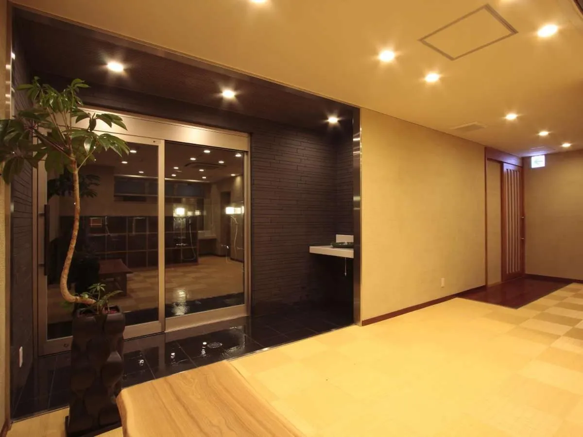 Bed in Kansai Airport Spa Hotel Garden Palace