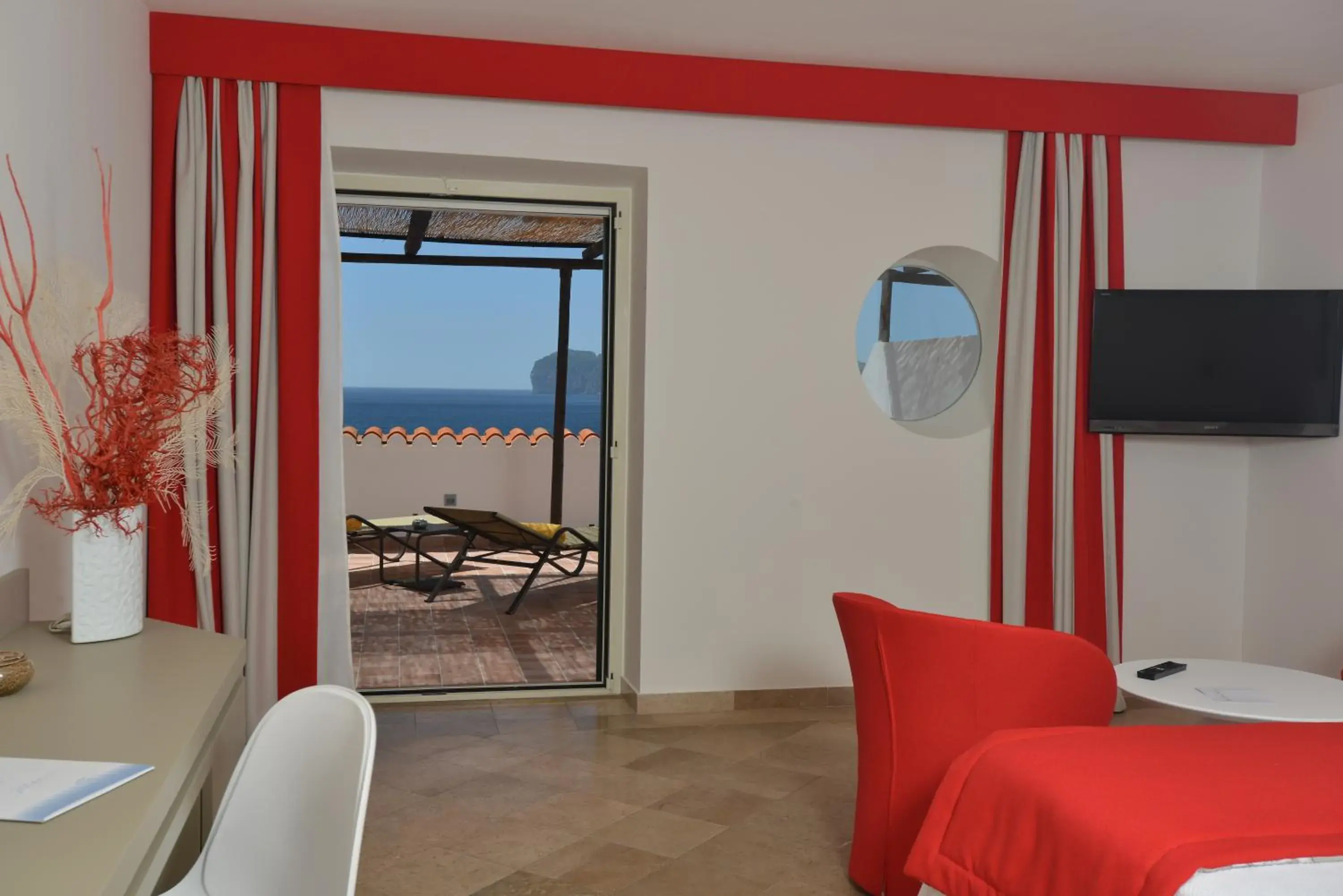 Bedroom, TV/Entertainment Center in El Faro Hotel & Spa