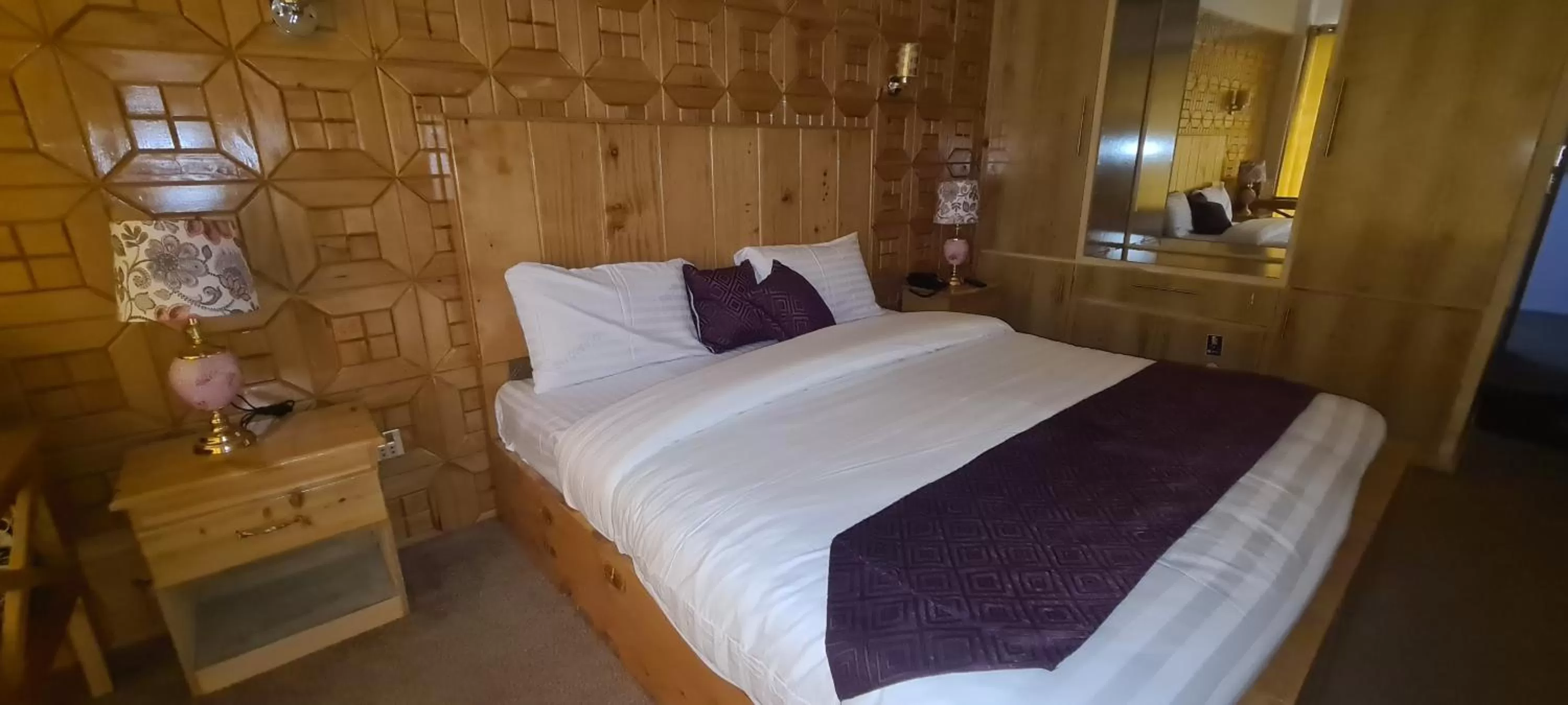 Bed in Indus Lodges Gilgit