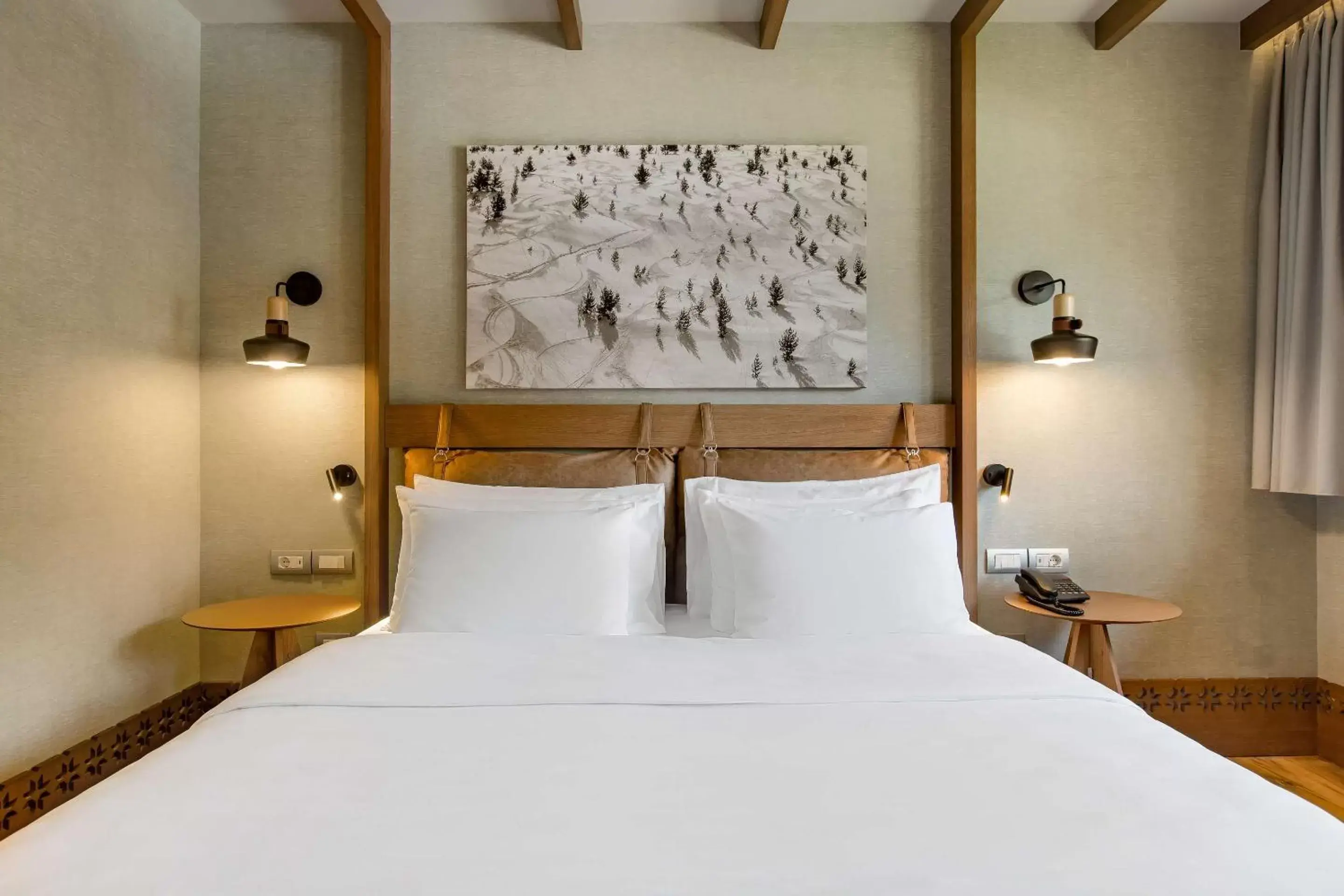 Bed in Grand Hotel Savoia Cortina d'Ampezzo, A Radisson Collection Hotel