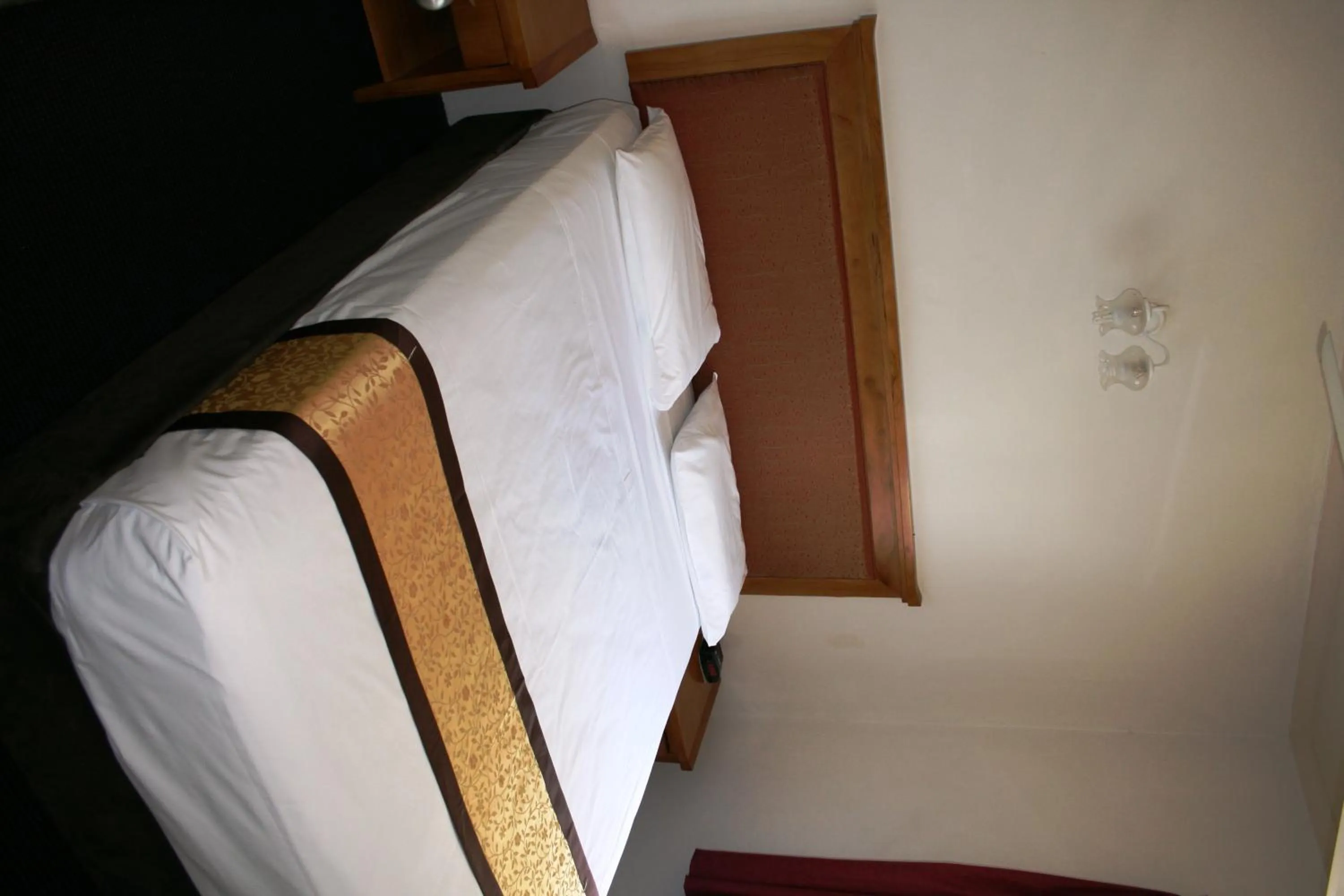 Bed in Luma Luma Holiday Apartments