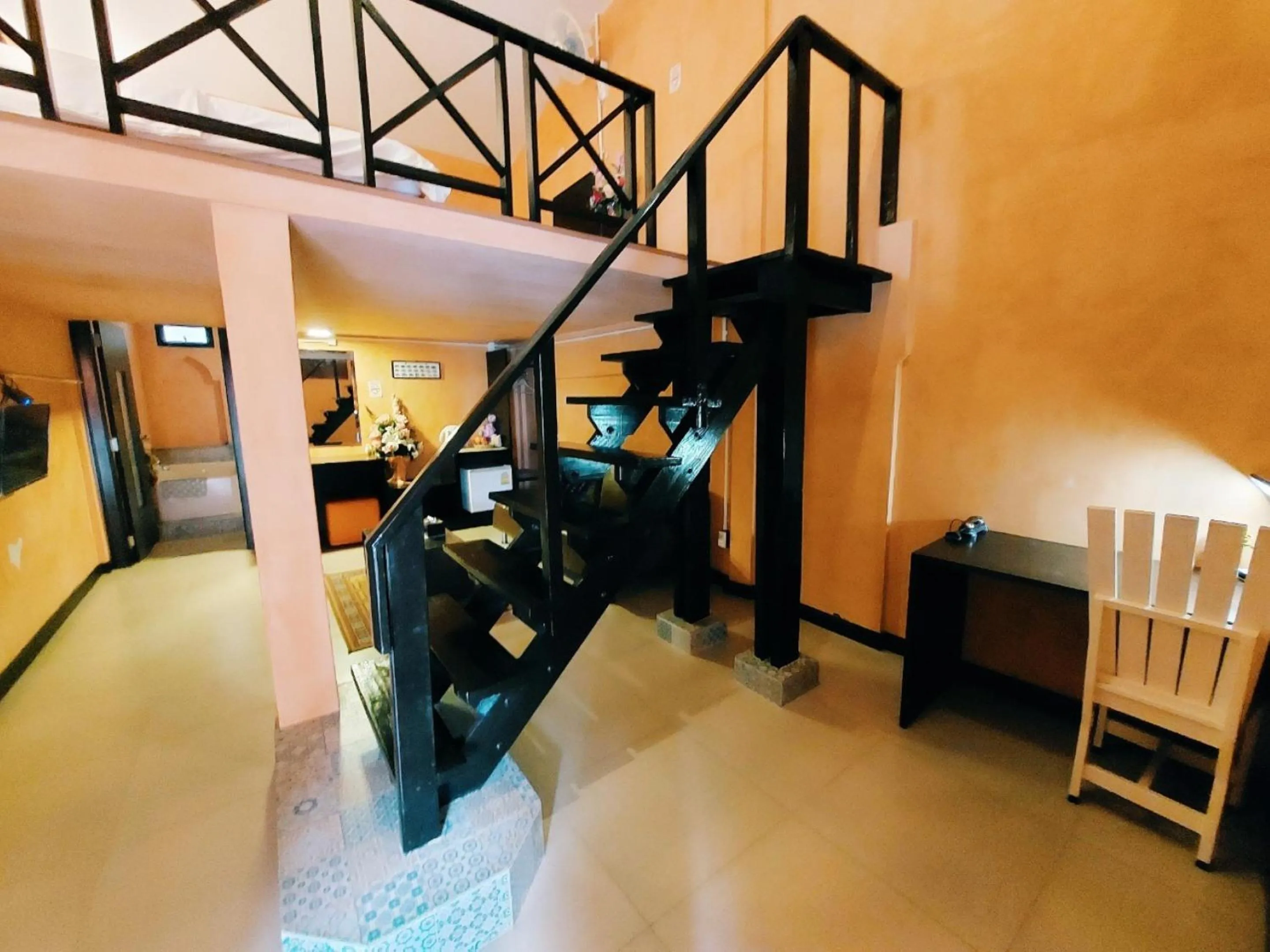 Photo of the whole room in Retro Box Hotel Chumphon