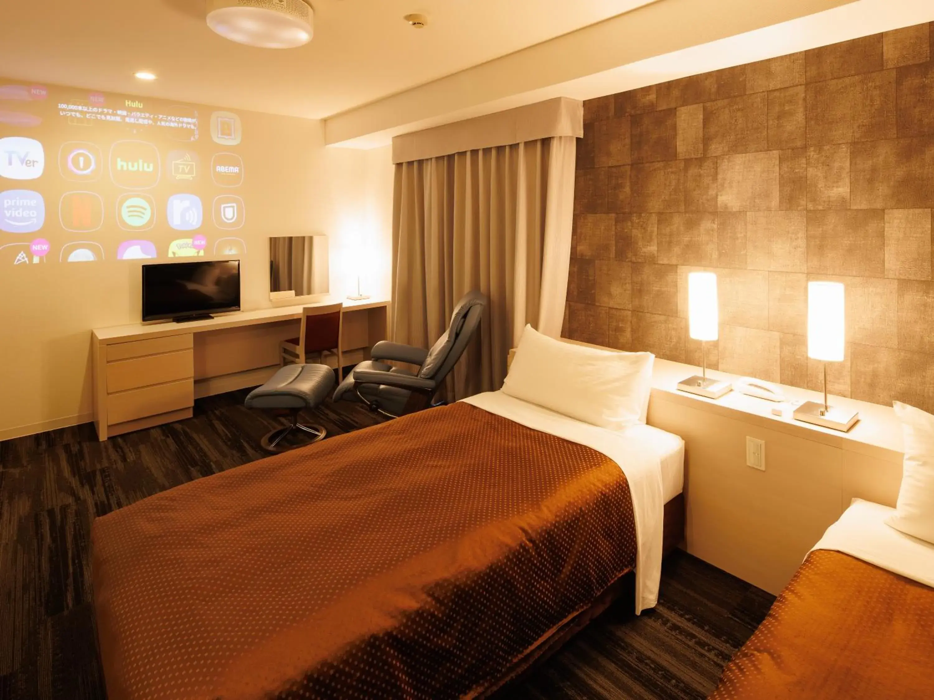 Photo of the whole room, Bed in J Hotel Rinku