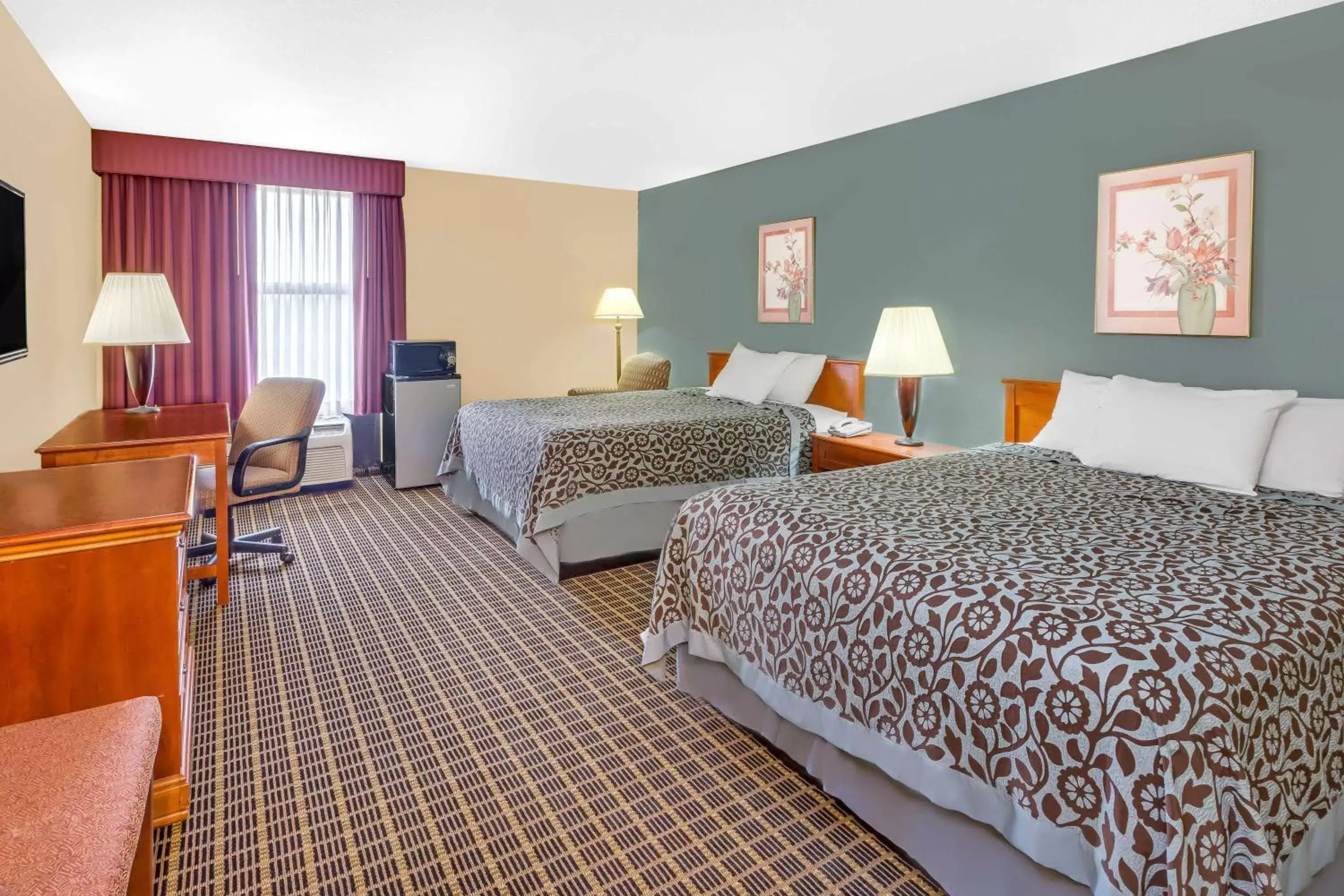 Photo of the whole room, Bed in Days Inn & Suites by Wyndham Kalamazoo