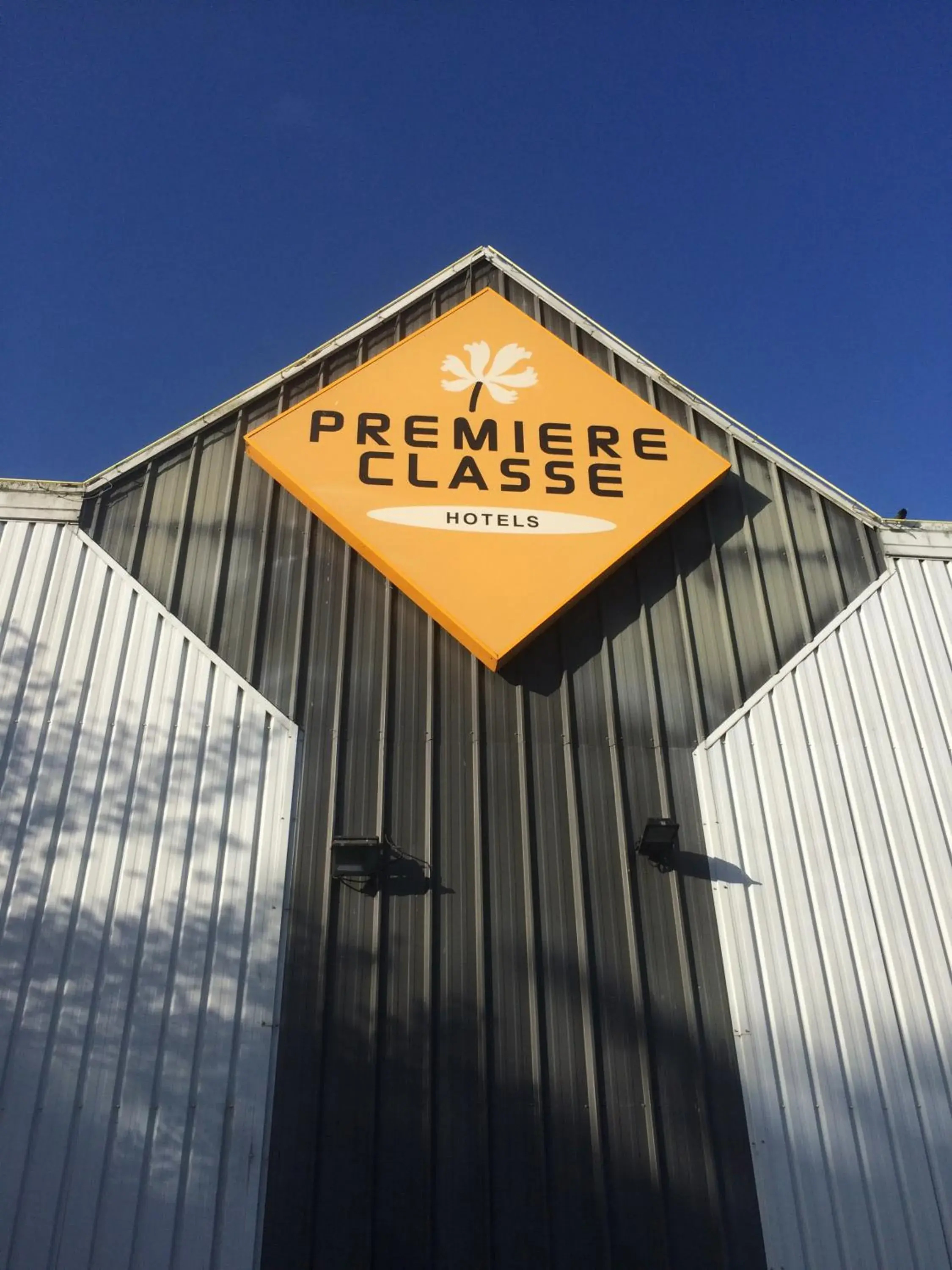 Property logo or sign in Premiere Classe Evreux