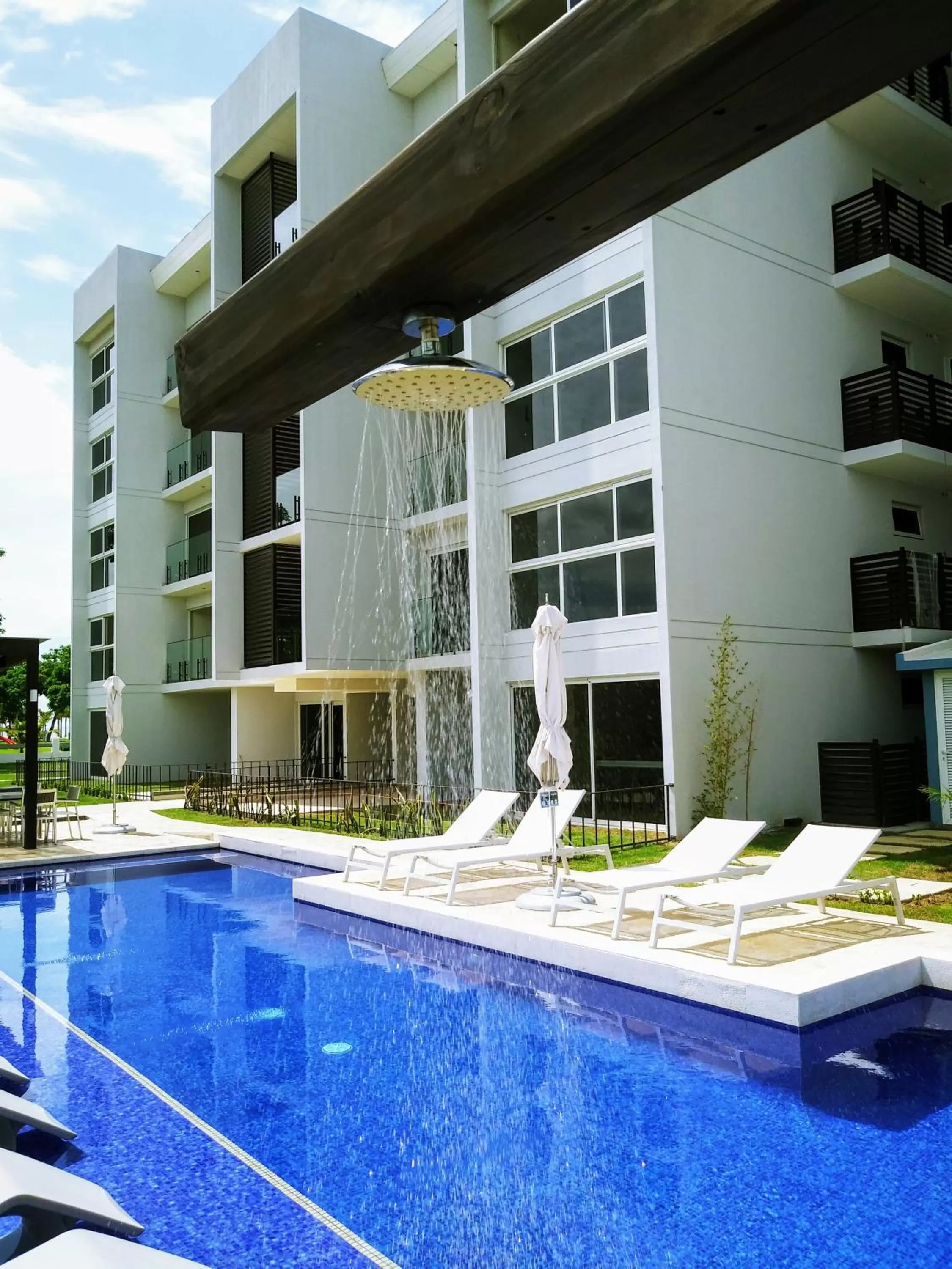Swimming pool, Property Building in Playa Caracol Residences