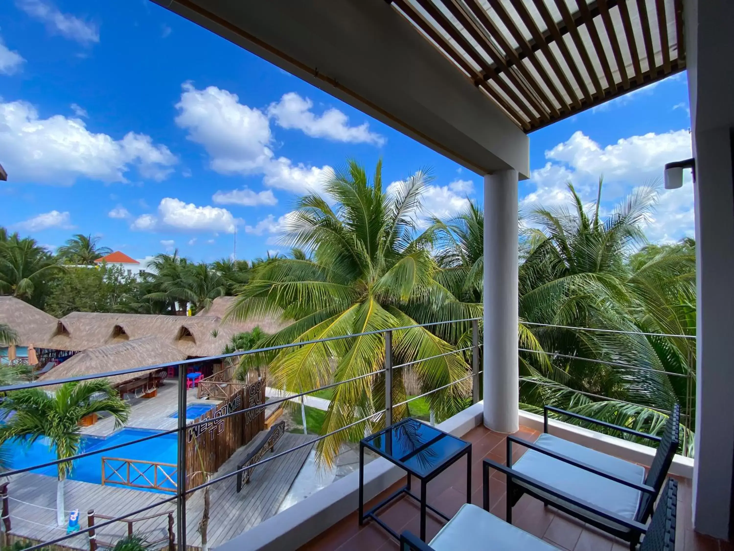 Balcony/Terrace, Pool View in Maia Suites Cozumel