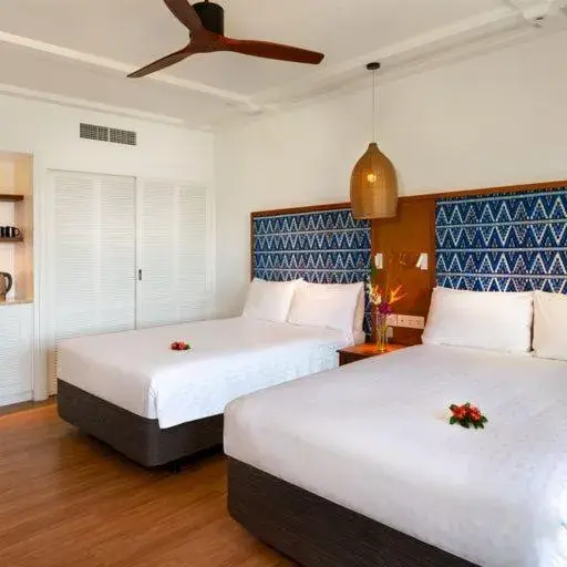 Bed in Outrigger Fiji Beach Resort