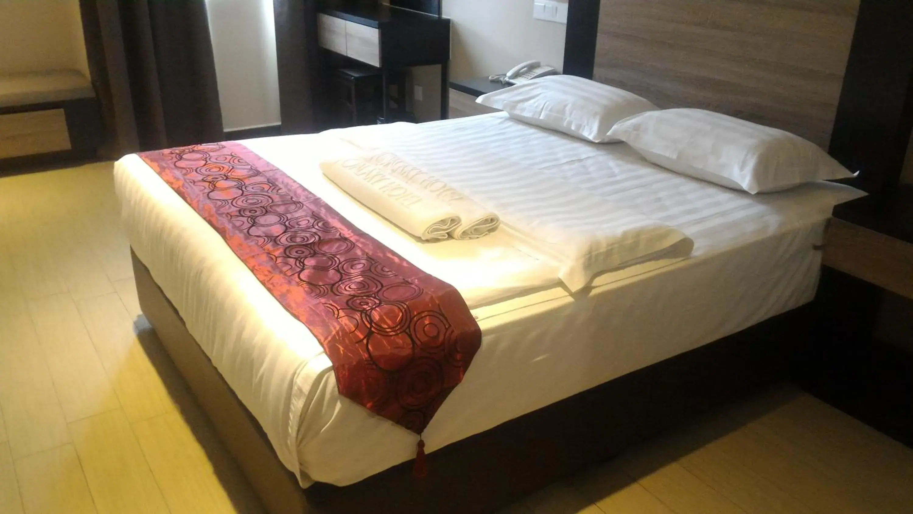 Bed in Galaxy Hotel